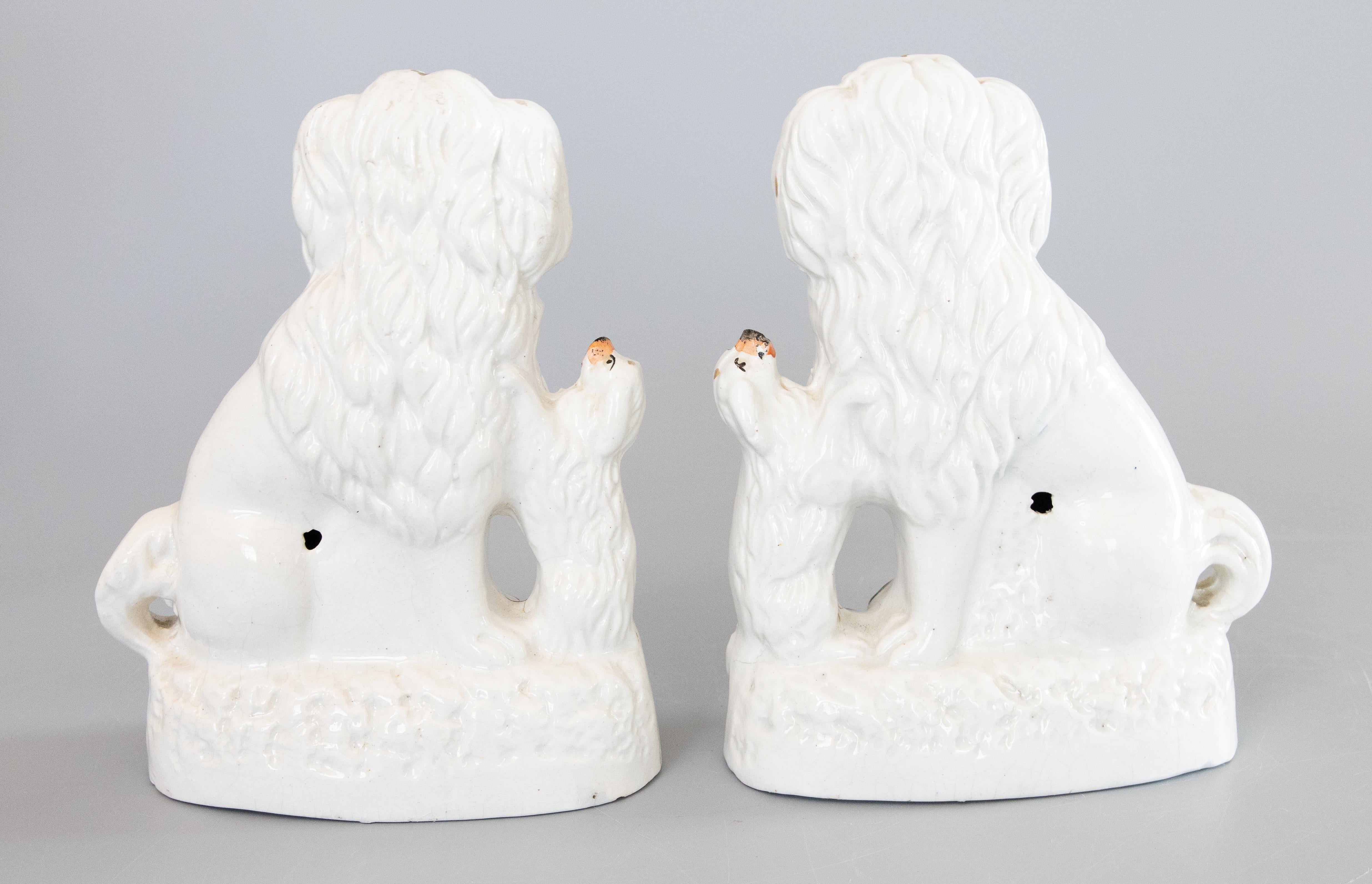 Rare Pair of 19th Century English Staffordshire White Spaniel Dogs With Pups In Good Condition For Sale In Pearland, TX