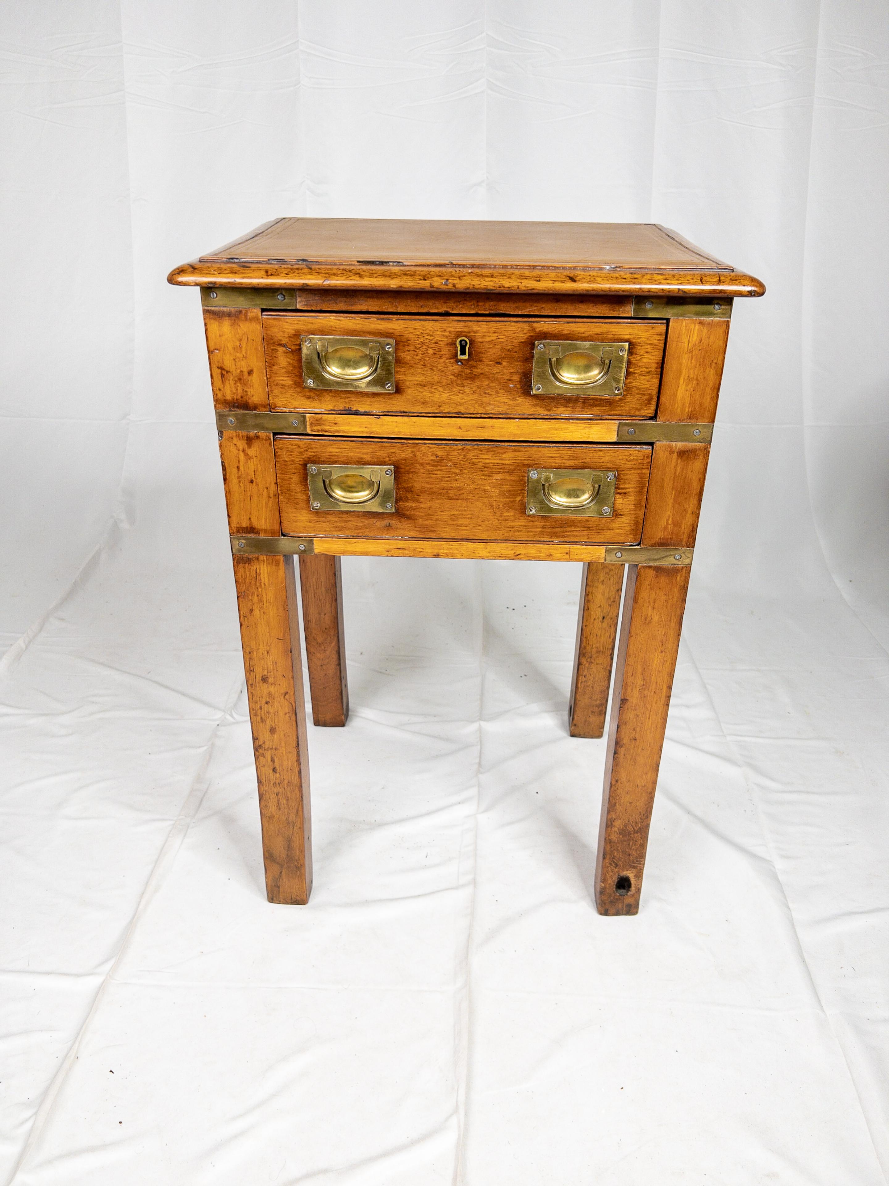 The Rare 19th Century French Campaign Chest on Legs is a remarkable piece of furniture that embodies both functionality and elegance. Crafted during the 19th century, it reflects the impeccable craftsmanship of the time. This unique chest stands out