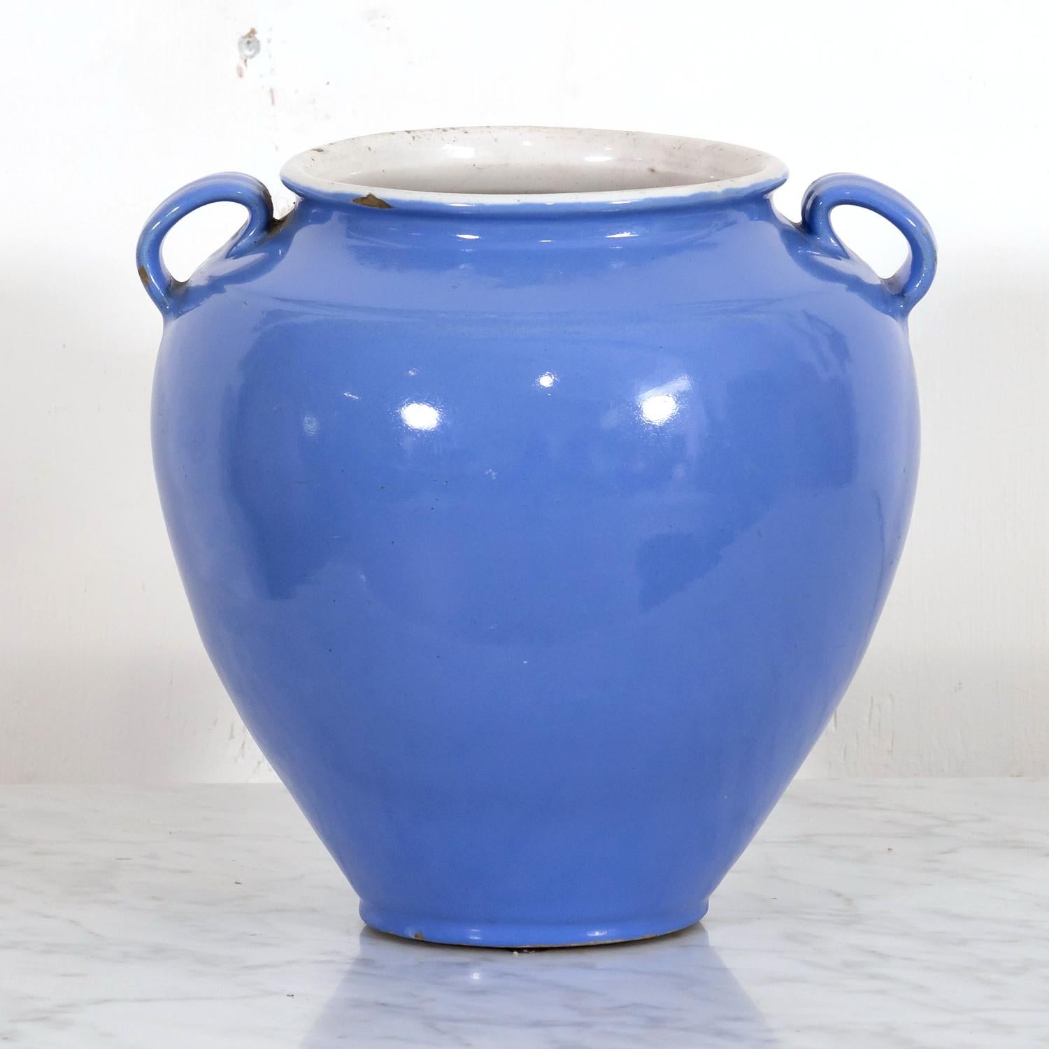 A 19th century French confit pot or egg pot with rare periwinkle blue exterior glaze and white interior glaze, circa 1890s, from Martres-Tolosone, a small village in southwest France near Toulouse, renowned for the pottery manufacturers called