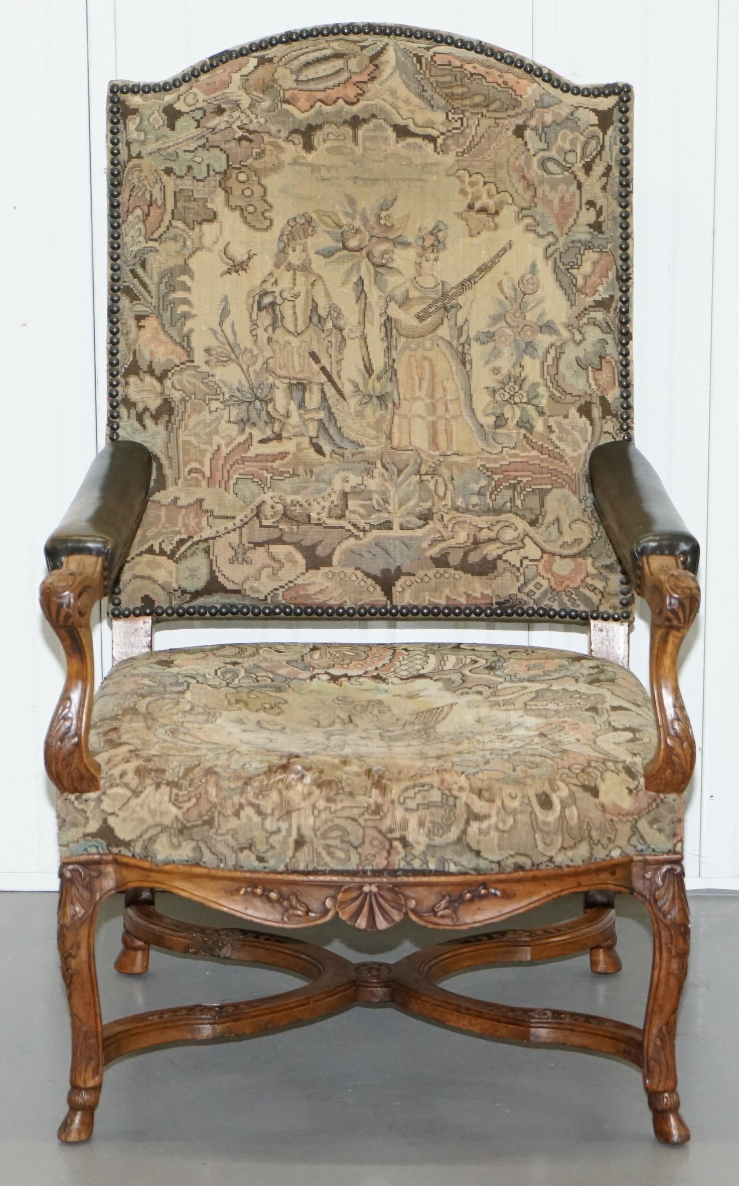 We are delighted to offer for this stunning hand made in France Embroidered carver armchair with carved frame

An extremely decorative and well made armchair, the carving is exquisite, just look at the end of the arms, the base splat has a very