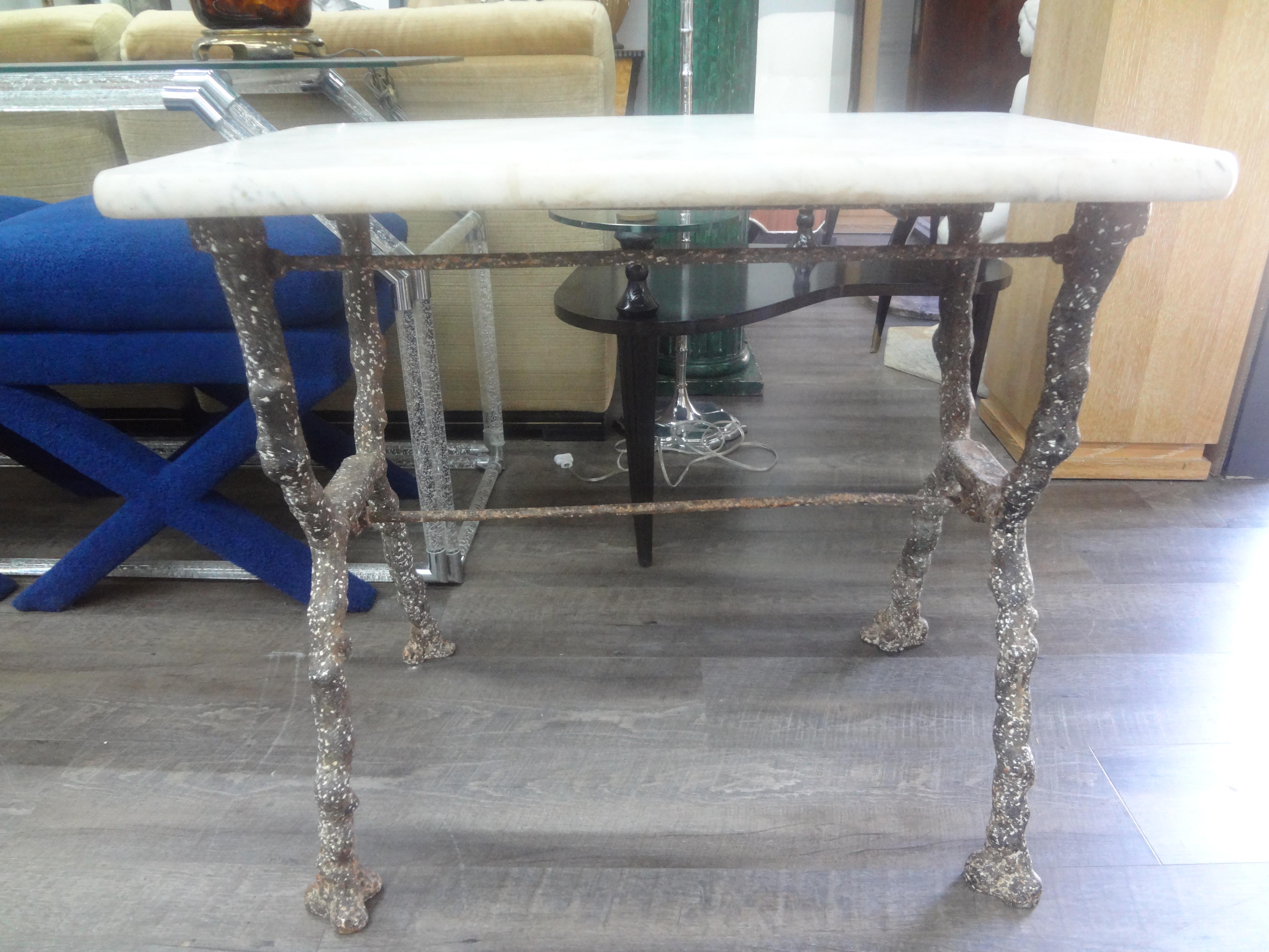 Rare 19th Century French Iron Garden Table With Marble Top By Arras.
Stunning 19th century French iron garden table or bistro table which has been cast to look like tree branches with the original marble top. This lovely table which can be used