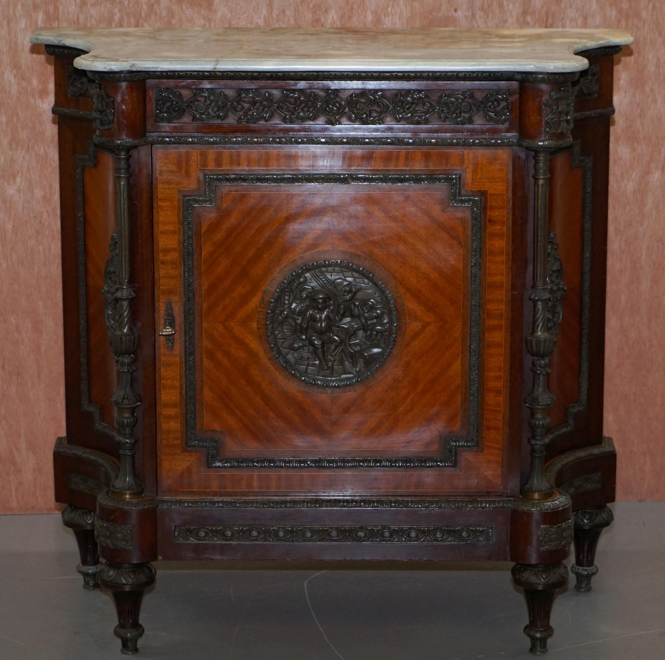 We are delighted to offer for sale this stunning 19th century French Louis walnut sideboard with solid marble top and bronze mounts throughout

A very good looking, decorative and well made antique sideboard, the walnut timber patina looks