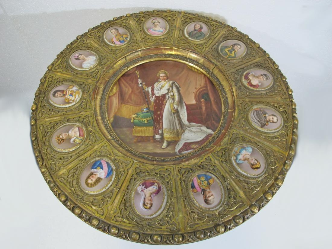 Fine and rare 19th century French Serve's porcelain topped and gilt carved salon table. Napoleon and his court are depicted with Josephine in a porcelain plaques in the center of the stretcher.
