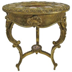 Rare 19th Century French Serve
s Porcelain Topped and Gilt Carved Salon Table Rare 19th Century French Serve
s Porcelain Topped and Gilt Carved Salon Table