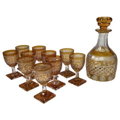 Raro decanter in ambra tagliato a trasparente del XIX secolo con 10 steli