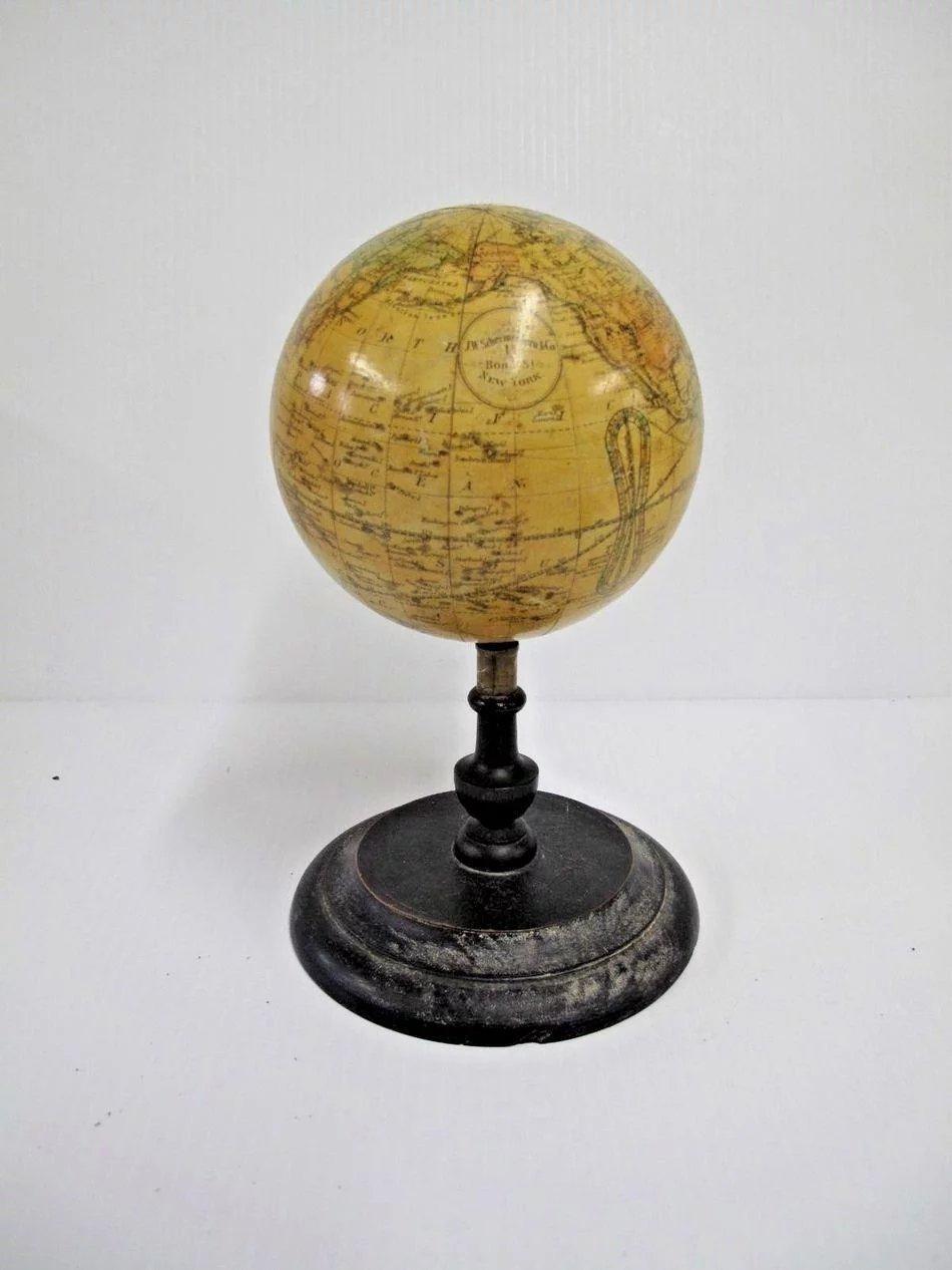 19th century globe, J.W. Schermerhorn & Co. 14 Bond St. New York, circa 1867.
5-inch diameter table globe on stand, 9 inches tall in total
Very detailed, Engraved hand colored gores over plaster with papier mâché. core. Orb sets onto the spindle.