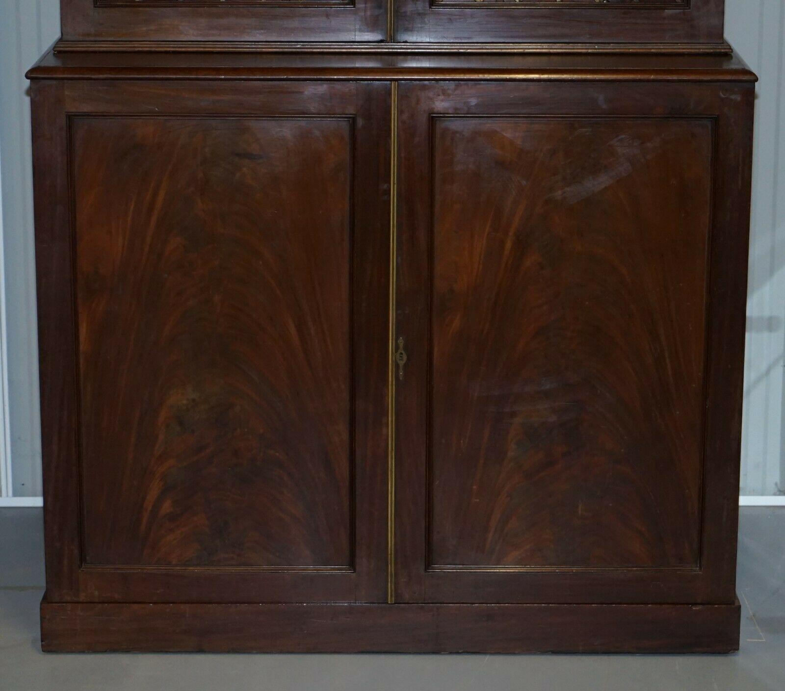 Hand-Crafted RARE 19TH CENTURY HARDWOOD PIERCED BRONZED DOOR BOOKCASE WiTH CHEST OF DRAWERS For Sale