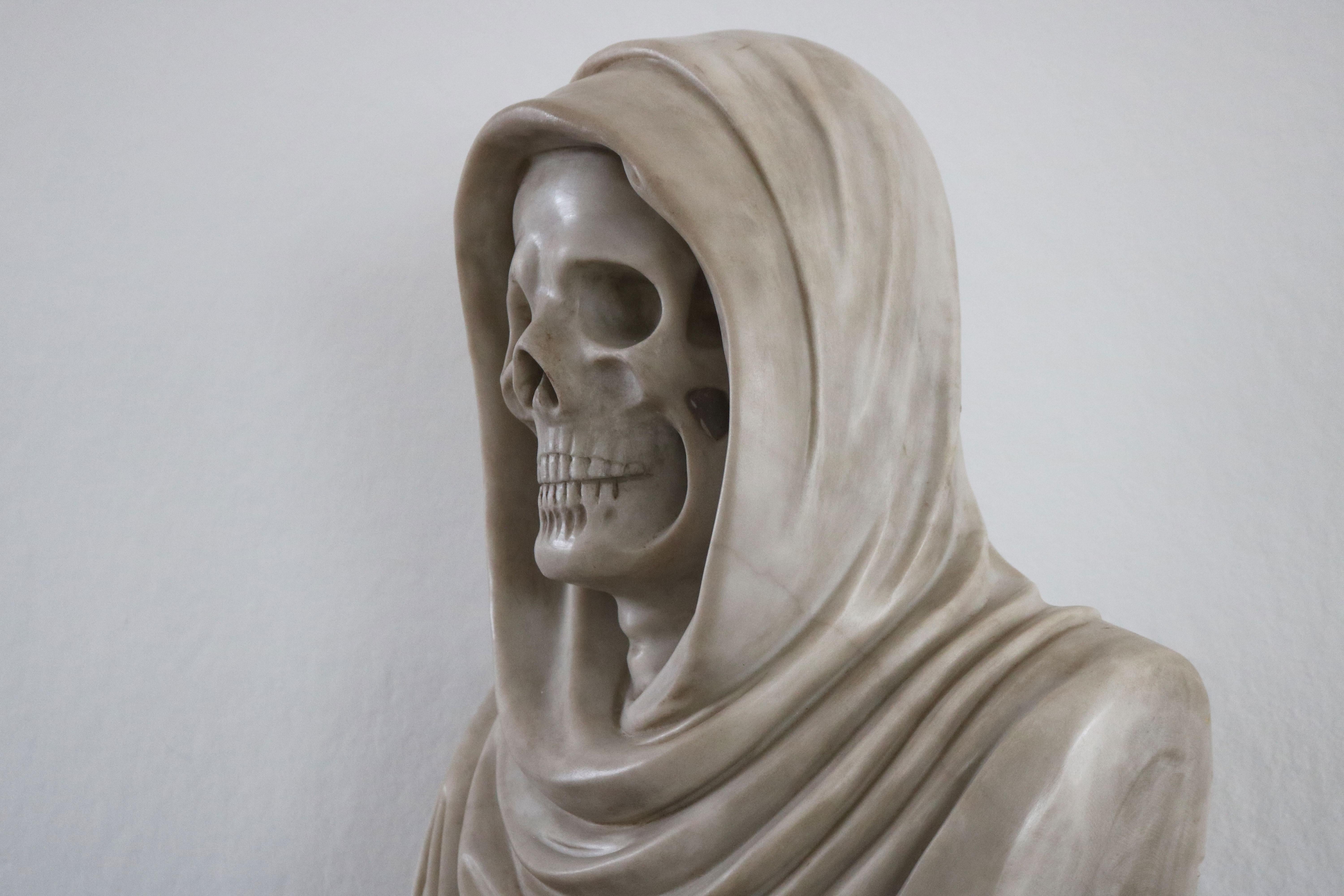 Masterfully carved Italian Vanitas / Memento Mori bust in solid marble from late 19th century. 
White Carrara marble skull combined with masterfully carved hood & robes all from one piece of solid Carrara marble 
Very large and impressive piece ,