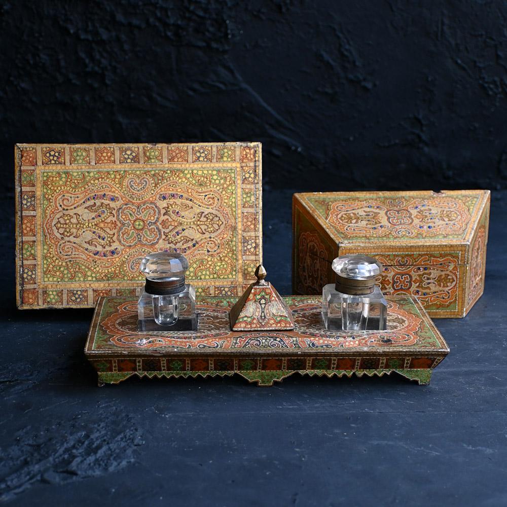 Rare 19th Century Kashmir Hand Painted Inkwell and Boxes Set 

A highly decorative and rare example of a late 19th Century hand painted Kashmir inkwell and boxes set. 

Size: (inkwell) H 4” x W 11.5” x D 6” (Large Box) H 2” x W 9” x D 6” (Small Box)