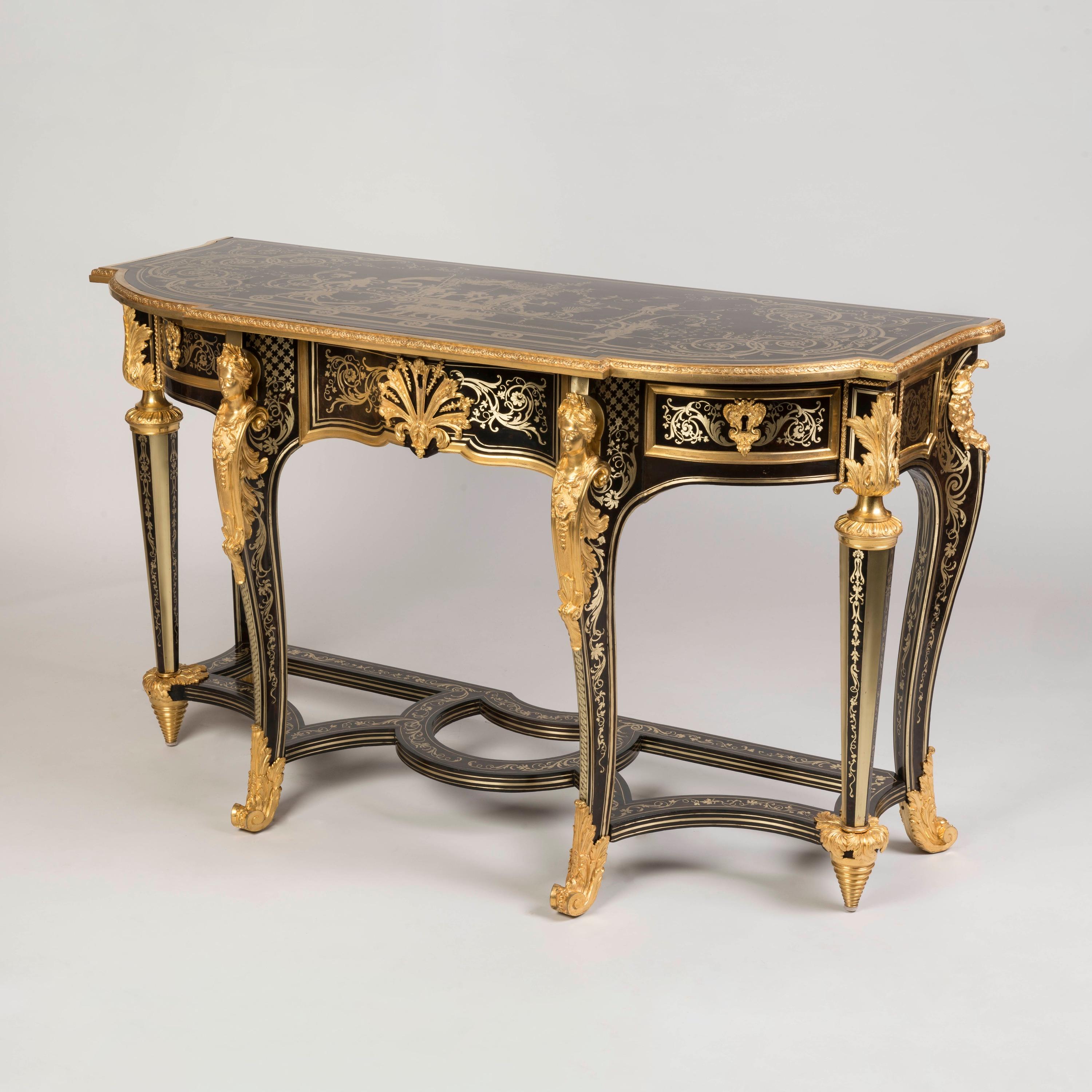 A Louis XIV Style Brass-Inlaid Marquetry Console Table
After the design by André-Charles Boulle

Constructed from ebony, with excellent hand-chased and gilded bronze mounts, the shaped console table inlaid with fine 'première-partie' marquetry of