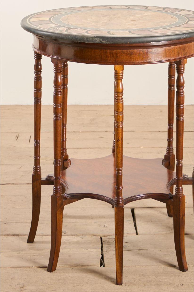 This is a truly exceptional 19th century Mahogany and Specimen marble side table. Gorgeous quality and originality. The base is very unusual with the amount of legs and shaped lower shelf. But the top is incredible. The mixture of marble and stone