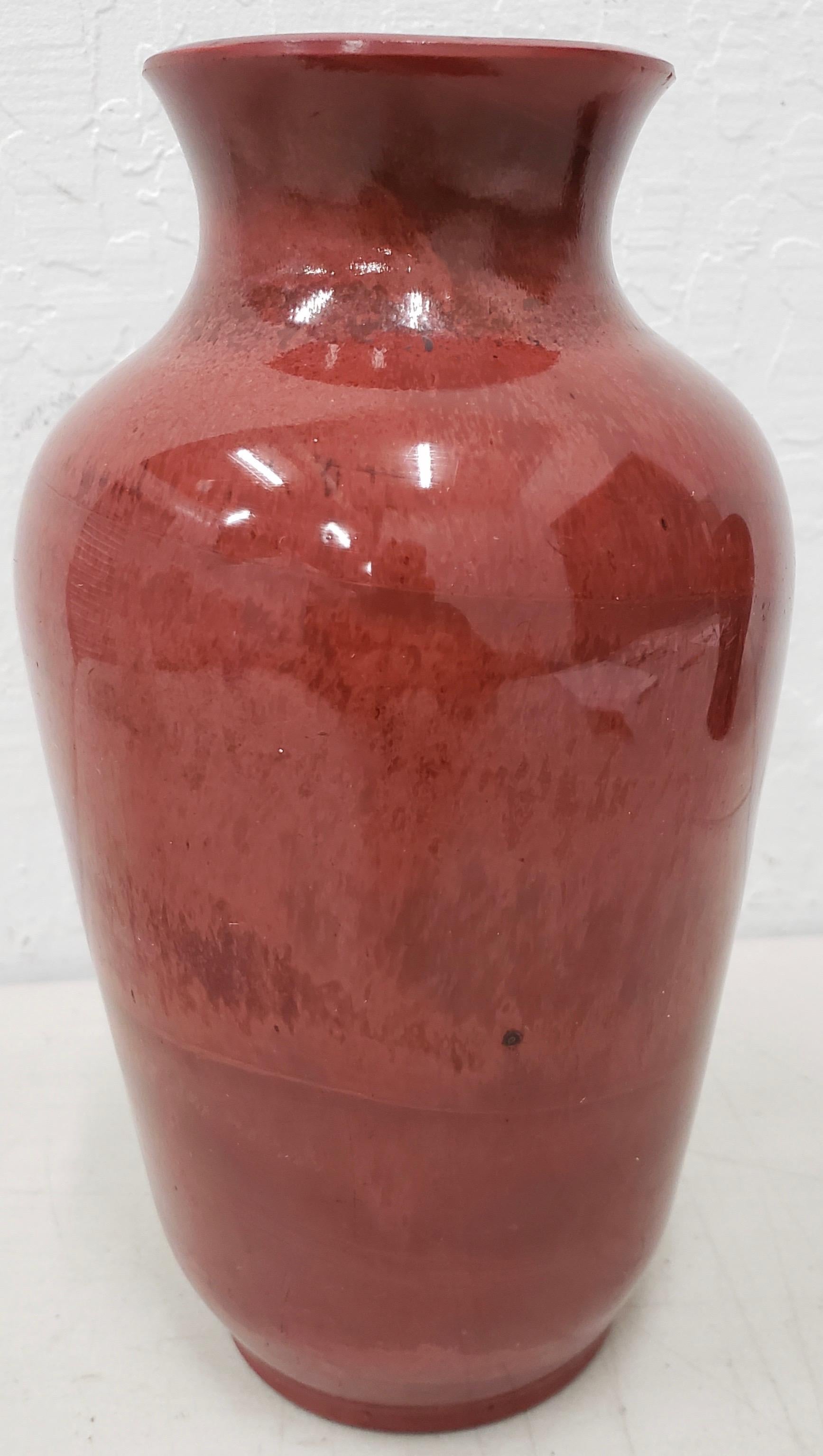 Rare 19th century mottled red peking glass vase

Dimensions 3.5