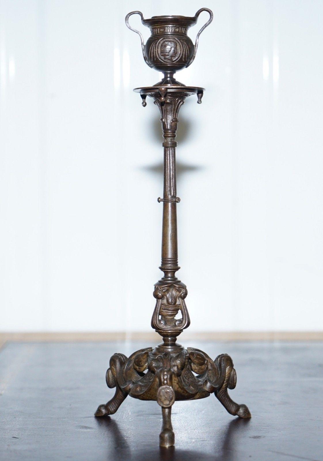 Wimbledon Furniture

We are delighted to offer for sale this simply stunning pair of solid bronze candlesticks after Auguste-Maximilien Delafontaine 

The pair of candelabrum stand on triform legs with paw feet, and floral and foliage decoration at
