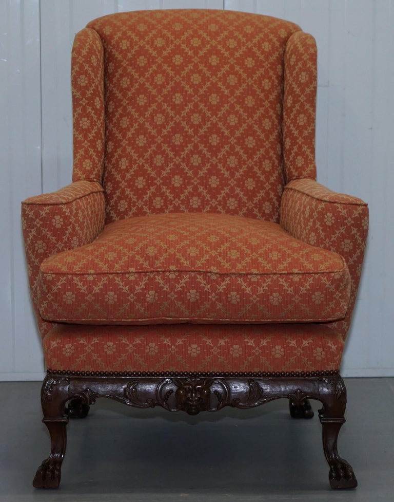 We are delighted to offer for sale this stunning 19th century easy wingback armchair after the great Thomas Chippendale

A very good looking well made and decorative armchair, the flat top arms are very 18th century, the carving and general style