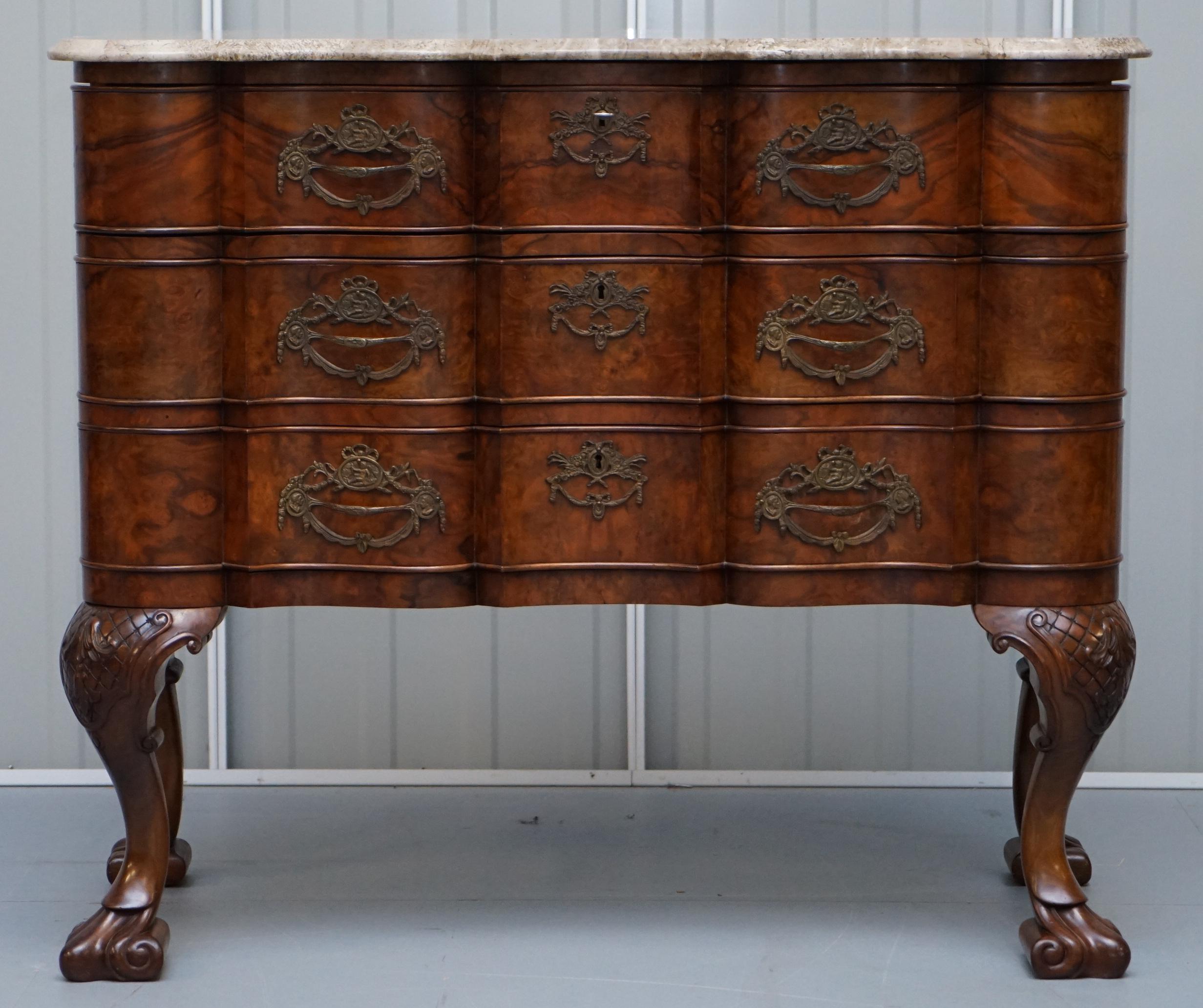 We are delighted to offer for sale this stunning and exceptionally rare serpentine fronted 19th century walnut chest of drawers commode with marble after Thomas Chippendale

A very good looking well made and decorative chest. The front is