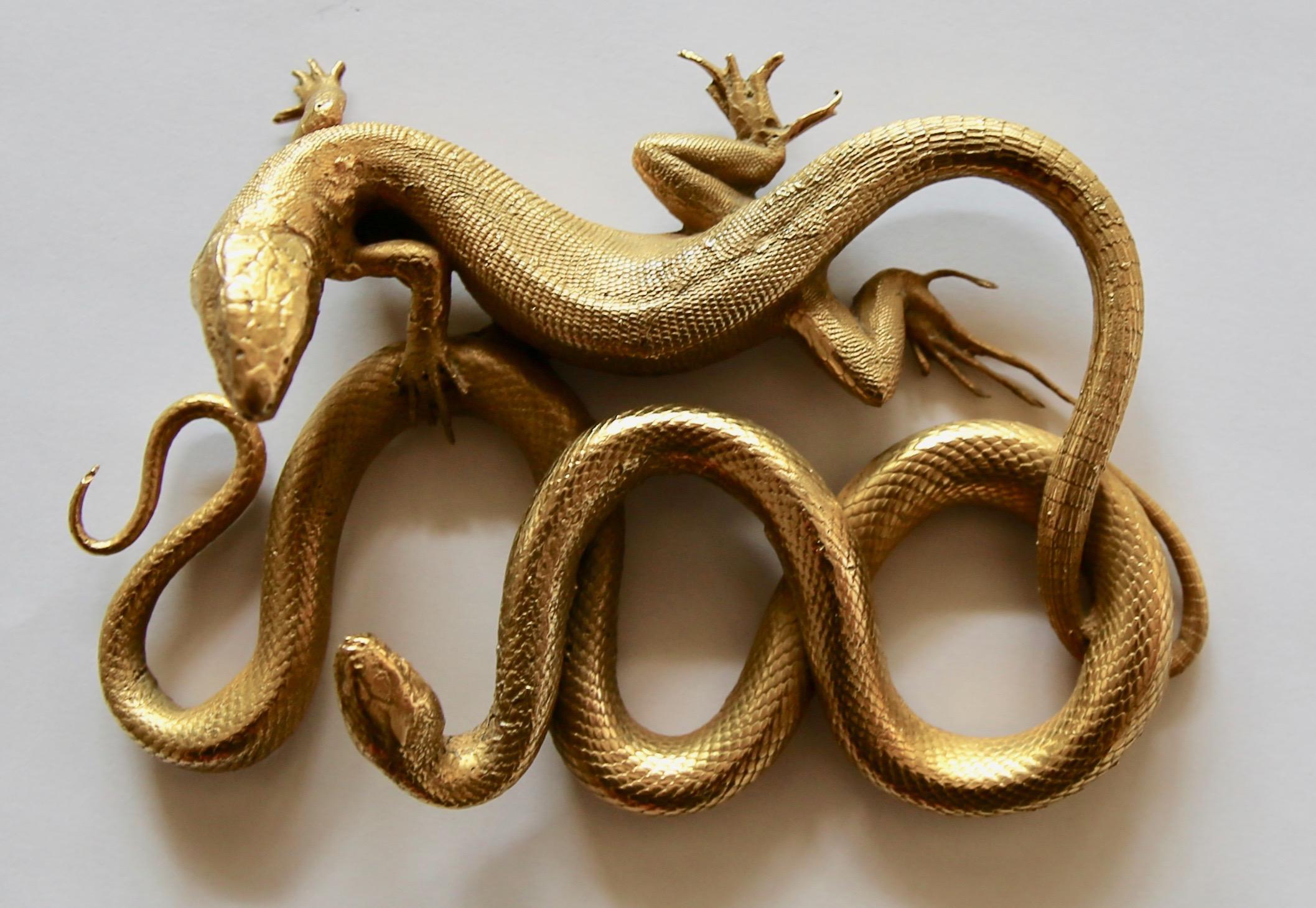 Rare snake and lizard gilt bronze piece, France 19th century, Empire period.
Beautiful quality of bronze. Measures: 5.5 in wide.

 