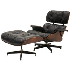 Rare 1st Series Eames Lounge Chair and Ottoman. Rosewood and Black Leather
