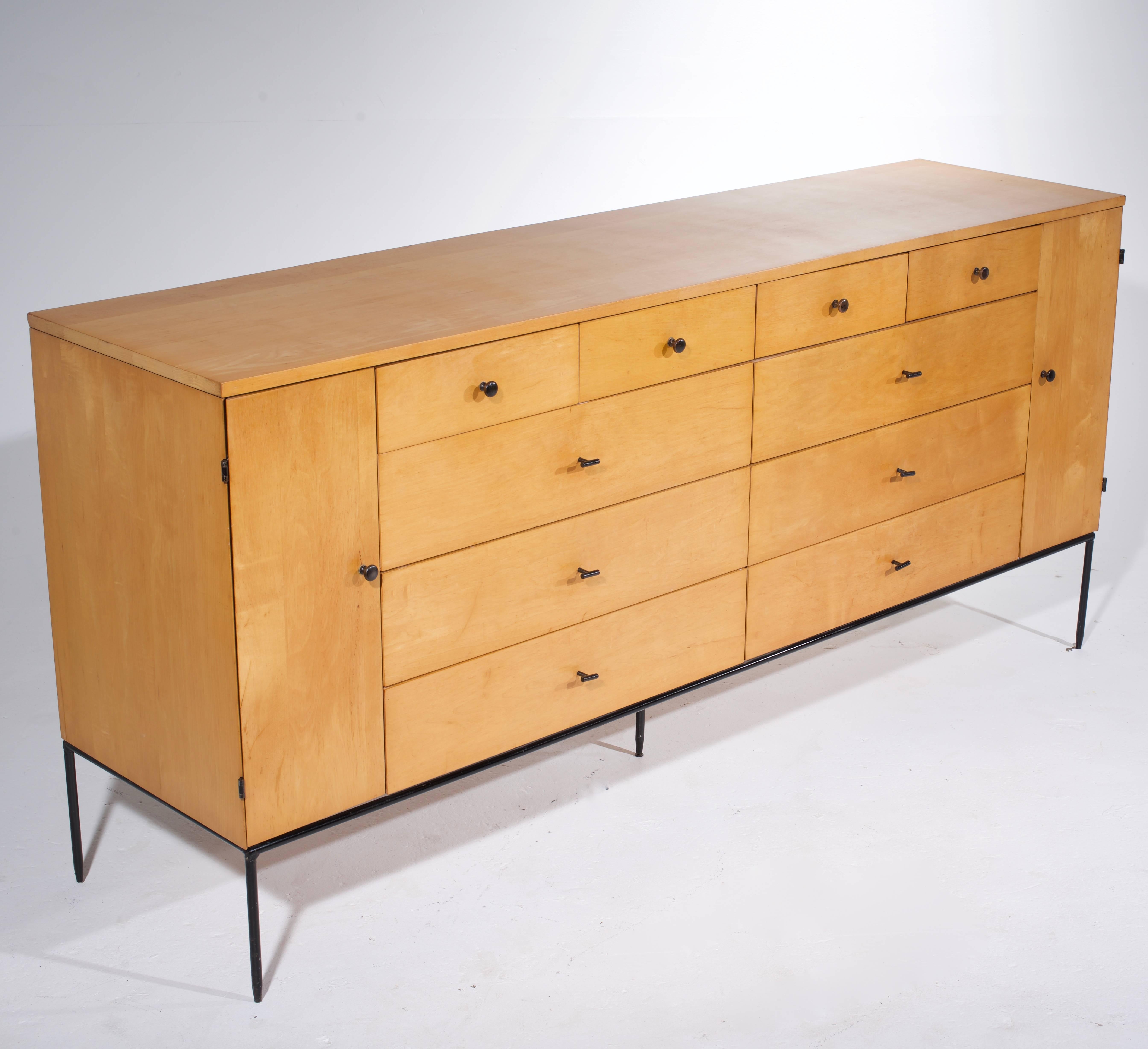 Extremely rare Paul McCobb 20-drawer dresser for Planner Group. This dresser is shown with a natural finish over solid maple cabinetry. Sold separately and shown is the even more rare vanity.