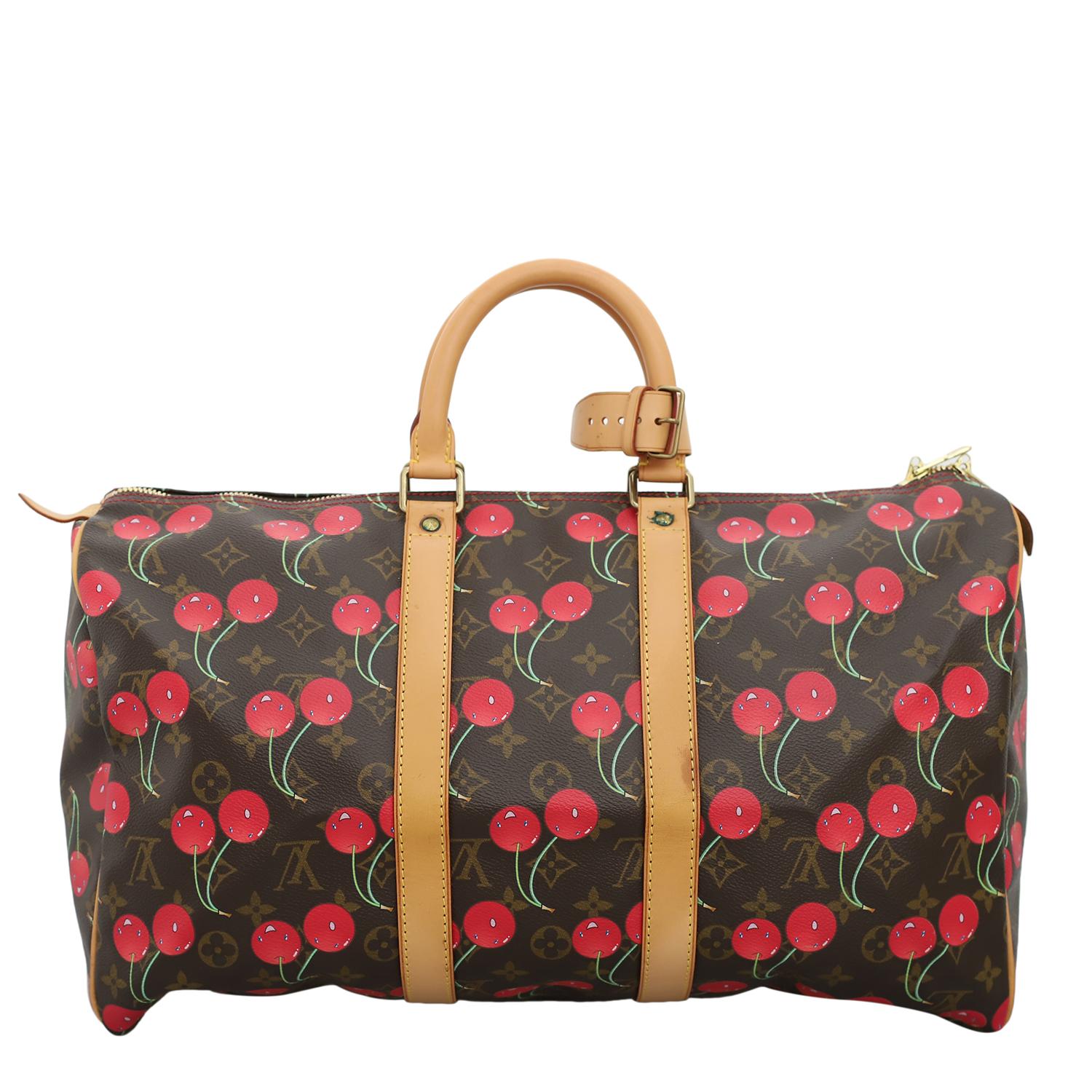 Super rare collectible Louis Vuitton and Takashi Murakami Cherry monogram keepall 45 bag. Very coveted piece. There are fold marks on the middle body due to storage. Gentle marks on middle vachetta leather surfaces. Darkening on the side logo