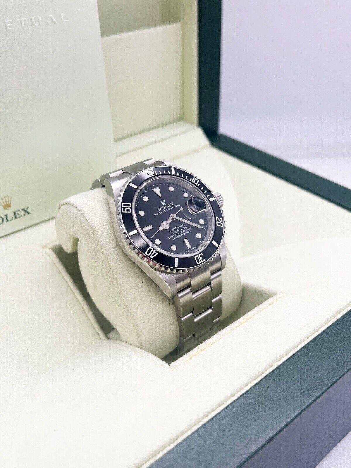RARE 2010 Rolex 16610 Submariner Black Dial Steel Box Paper REHAUT UNPOLISHED In Excellent Condition For Sale In San Diego, CA