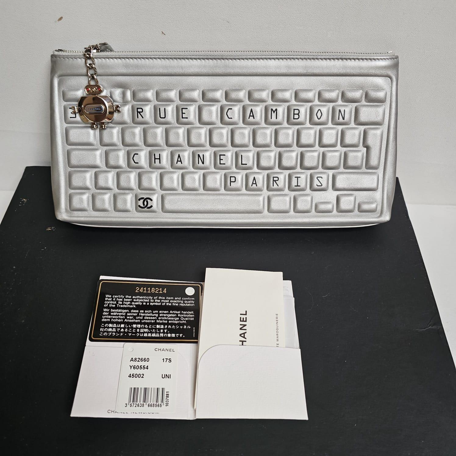 Rare 2017 Chanel Metallic Silver Keyboard Zip Clutch For Sale 2