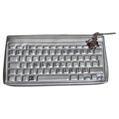 Used Rare 2017 Chanel Metallic Silver Keyboard Zip Clutch
