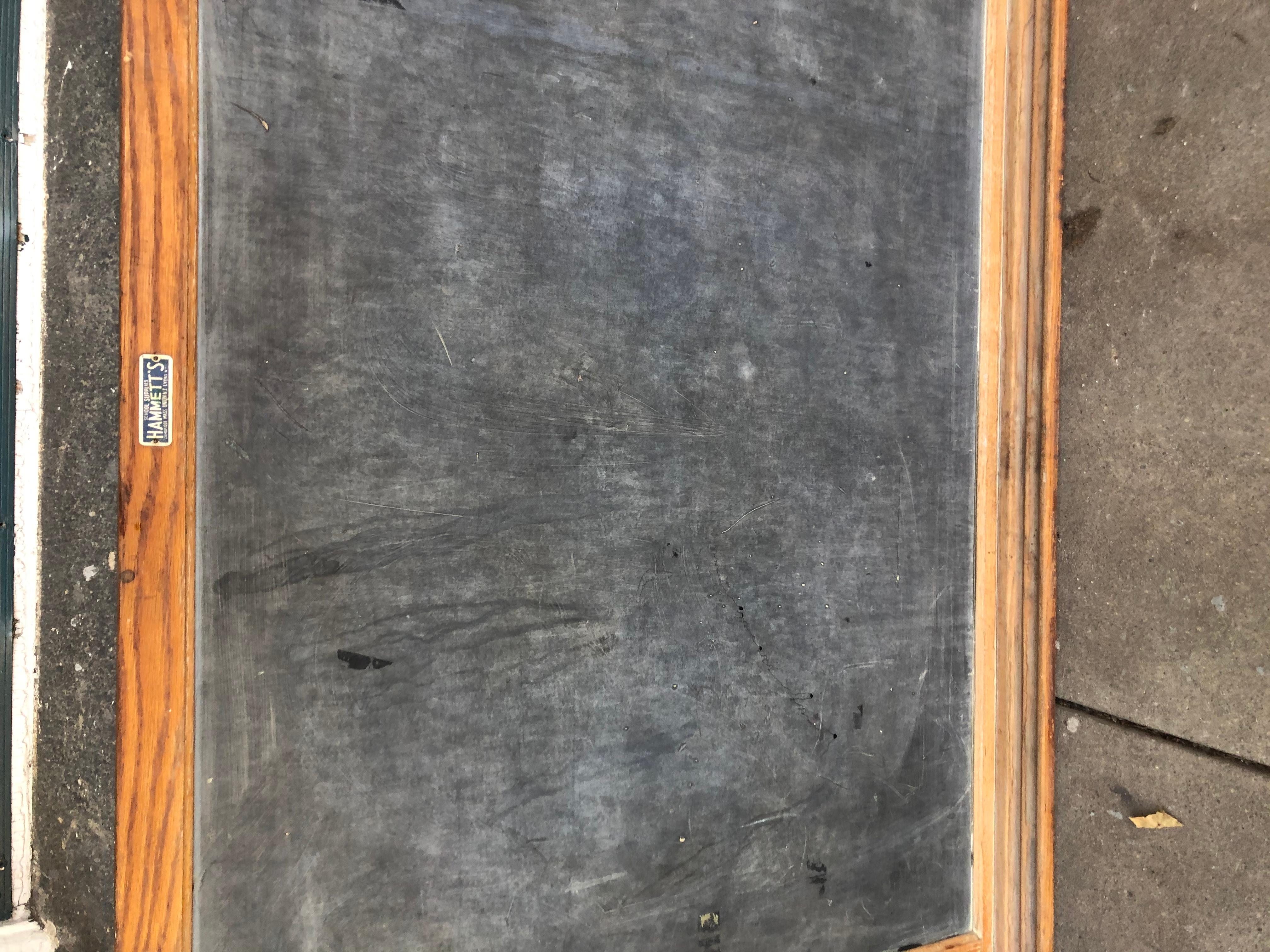 Beautiful old school (pun intended) chalkboard with oak frame. Signed and produced by Hammett’s School Supplies. Double sided. Black and green. An amazing piece of American history.