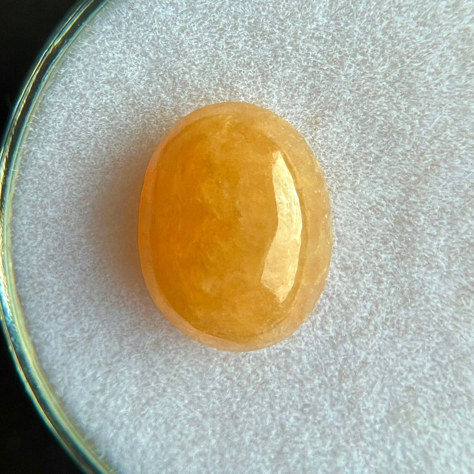 Femenino o masculino Raro 2.69ct GIA Certificado Amarillo Naranja Jadeíta Jade a Grado Oval Cab Sin Tratar en venta