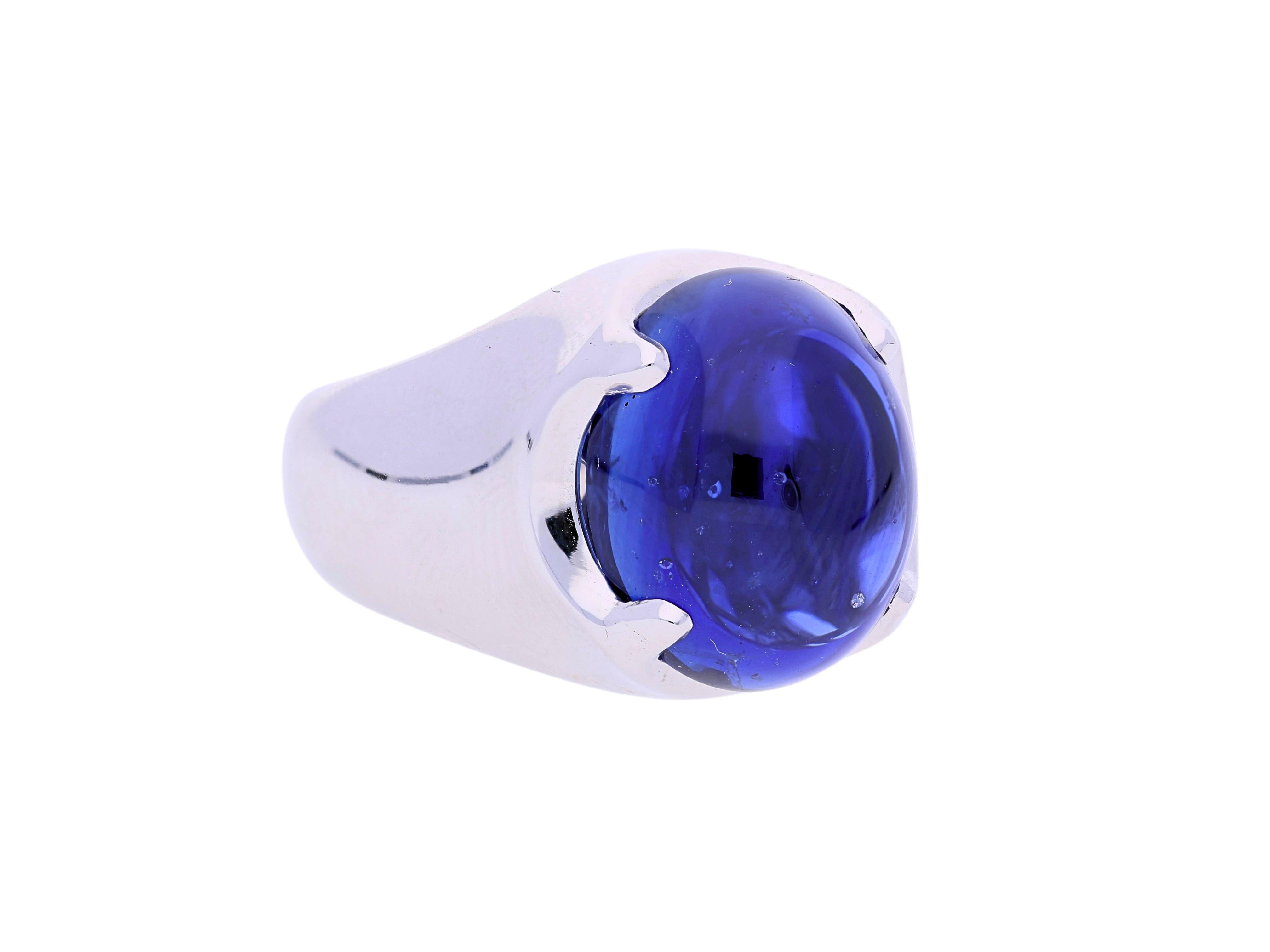 29.51 Carat No Heat Ceylon Blue Sapphire Cabochon Solitaire Mens Ring in 18K White Gold. AGL Certified. 

Jewelry Details:
- Item Type: Solitaire Ring
- Metal Type: 18K White Gold
- Weight: 25.81 grams
- Ring Size: 8 (adjustable)

Center Stone