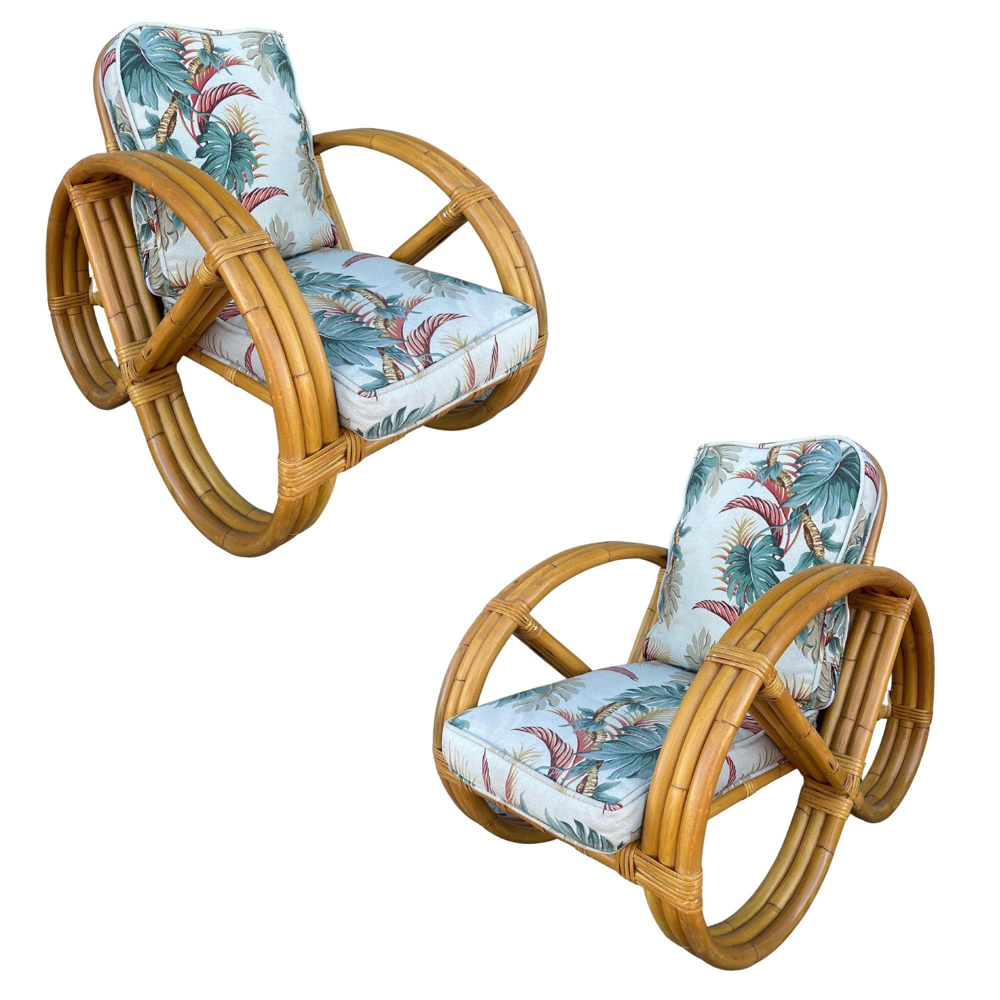 Rare three-strand round full pretzel arm rattan living room set featuring a pair of lounge chairs and a settee with fancy wicker wrappings.

Chairs: 23