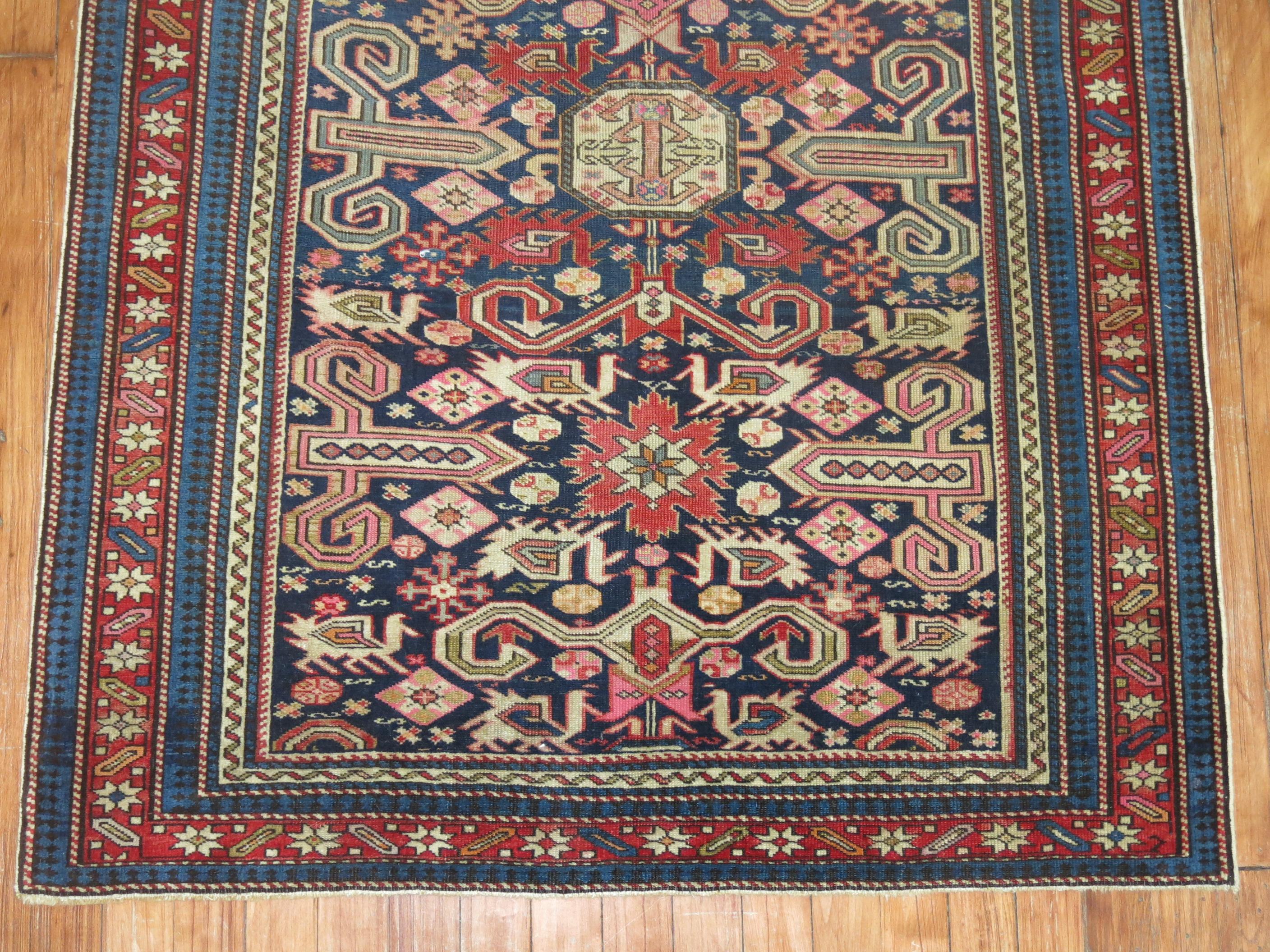 A geometric tribal looking Caucasian Shirvan rug from the late 19th century. 

Measures: 3'3” x 4'3”

Antique Caucasian rugs from the Shirvan district village are still considered one of the best decorative and collector type of rugs from that