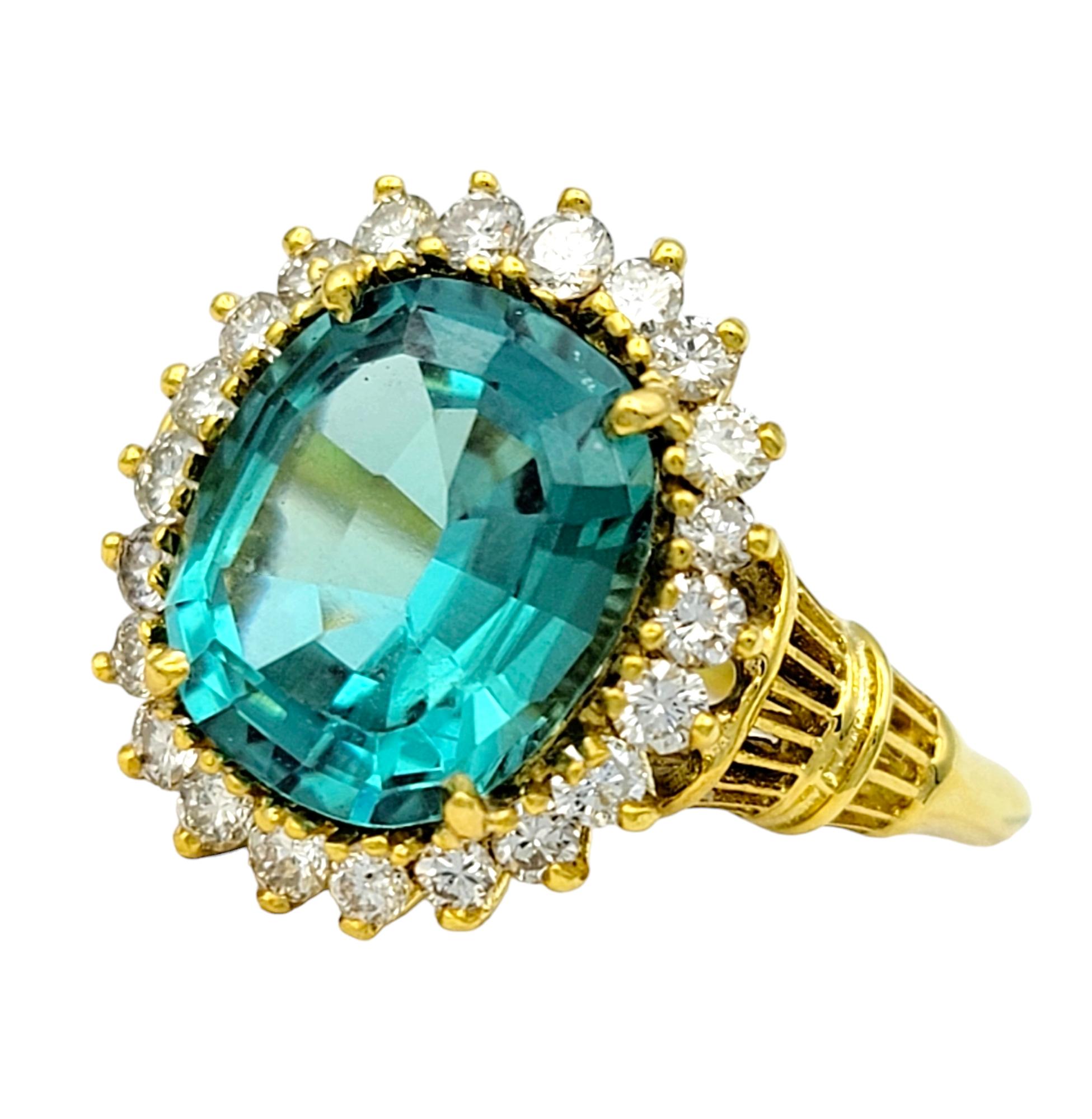 Contemporary Rare 3.0 Carat Oval Cut Indicolite Tourmaline Ring with Diamond Halo in 18K Gold For Sale