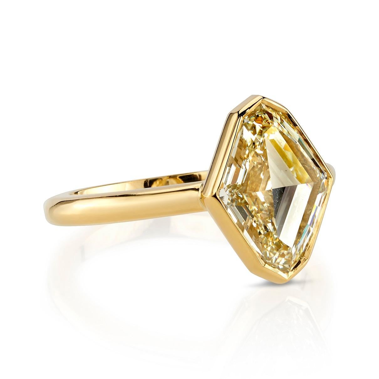 3.00ct M/VS2 GIA certified Lozenge cut diamond set in a handcrafted 18k yellow gold ring. Ring is currently a size 6 and can be sized to fit. 