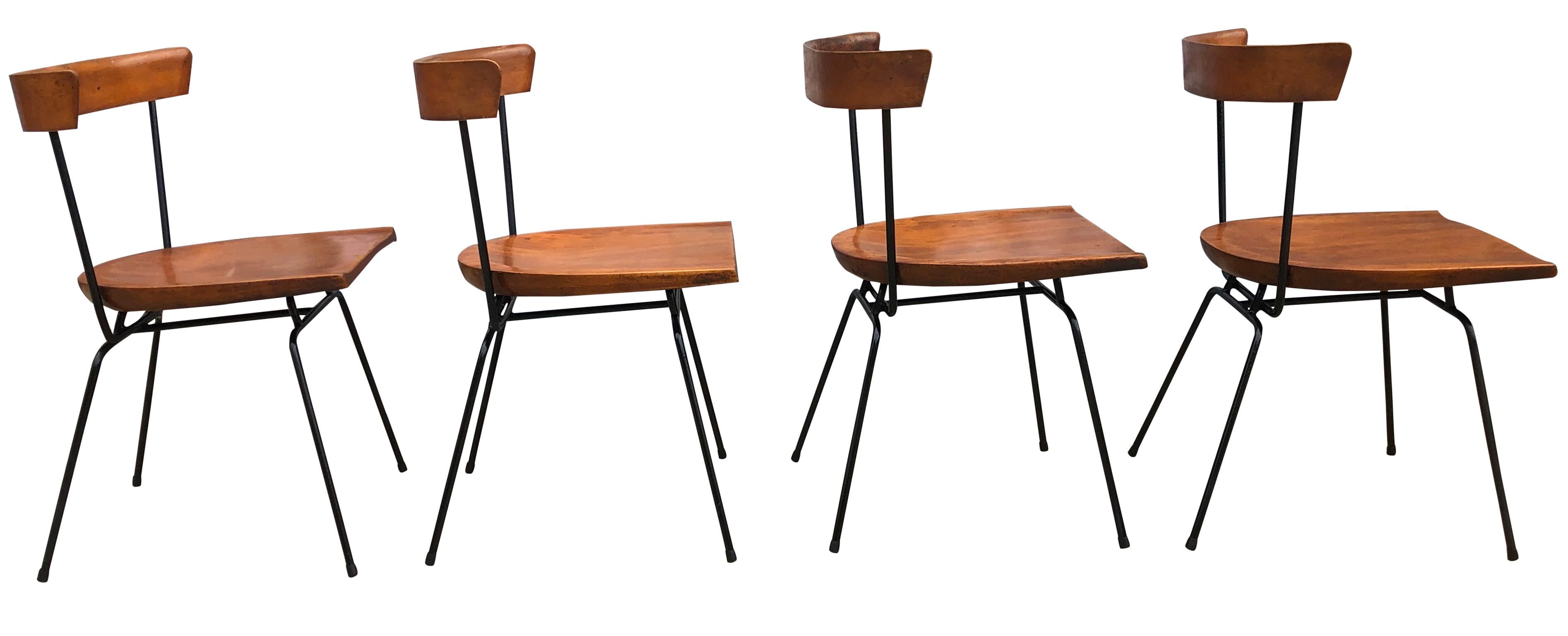 Four all original rare midcentury maple Paul McCobb Planner Group #1535 iron side dining chairs. Solid maple seat and curved back on Iron base. Original vintage condition. Original brown tobacco finish. These chairs are marked Paul McCobb by