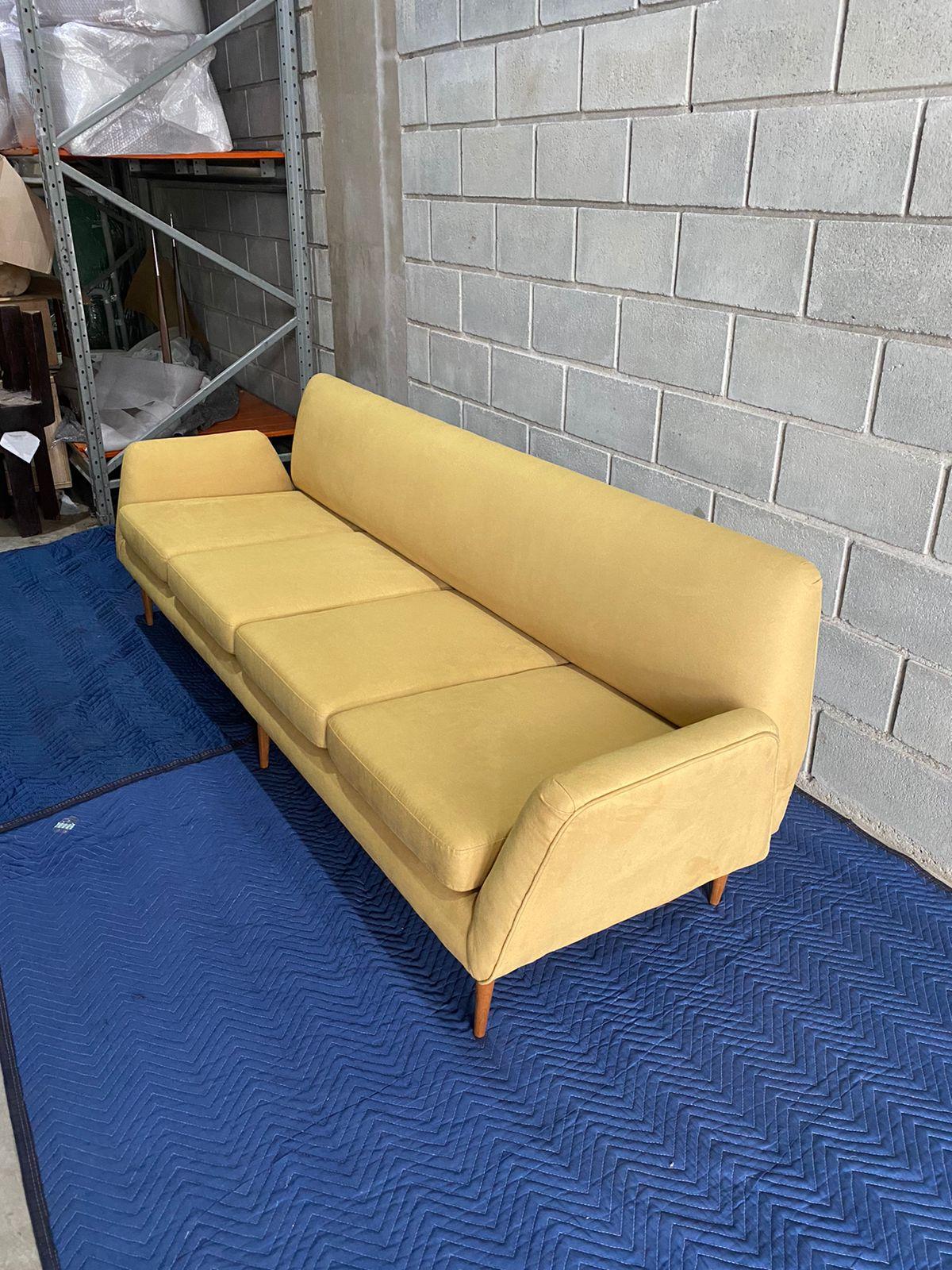 Designed by Martin Eisler for his company FORMA S/A, this is a rare 4-seater version of a very iconic sofa in Midcentury Brazilian.

Feet are in Pau-Marfim wood.