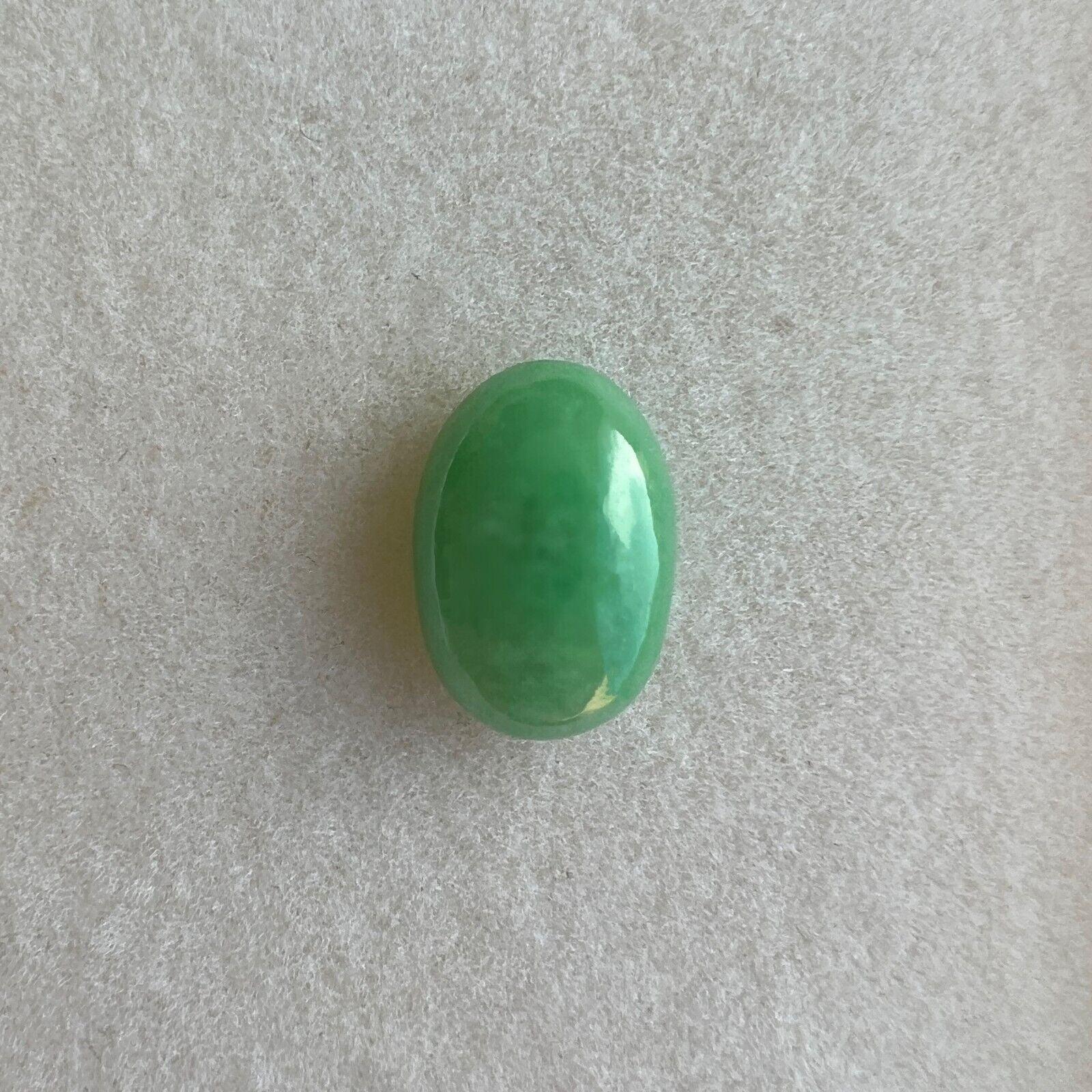 Rare 4.21ct IGI Certified Green Jadeite Jade ‘A’ Grade Oval Cabochon Loose Gem

IGI Certified Untreated A Grade Green Jadeite Gemstone.
4.21 Carat with an excellent oval cabochon cut and bright green colour. Fully certified by IGI in Antwerp
