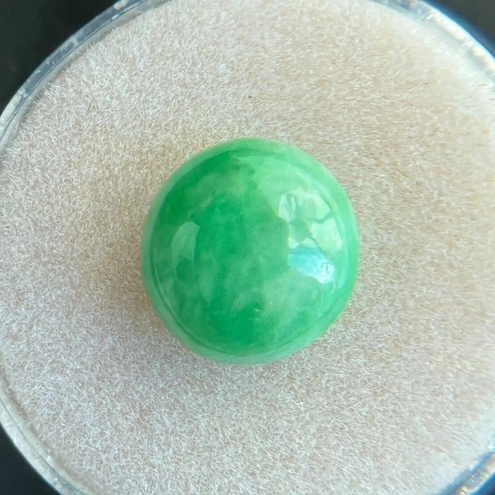 Rare 4.28ct IGI Certified Green Jadeite Jade ‘A’ Grade Oval Cabochon Loose Gem

IGI Certified Untreated A Grade GreenJadeite Gemstone.
4.28 Carat with an excellent oval cabochon cut and bright green colour. Fully certified by IGI in Antwerp, one of