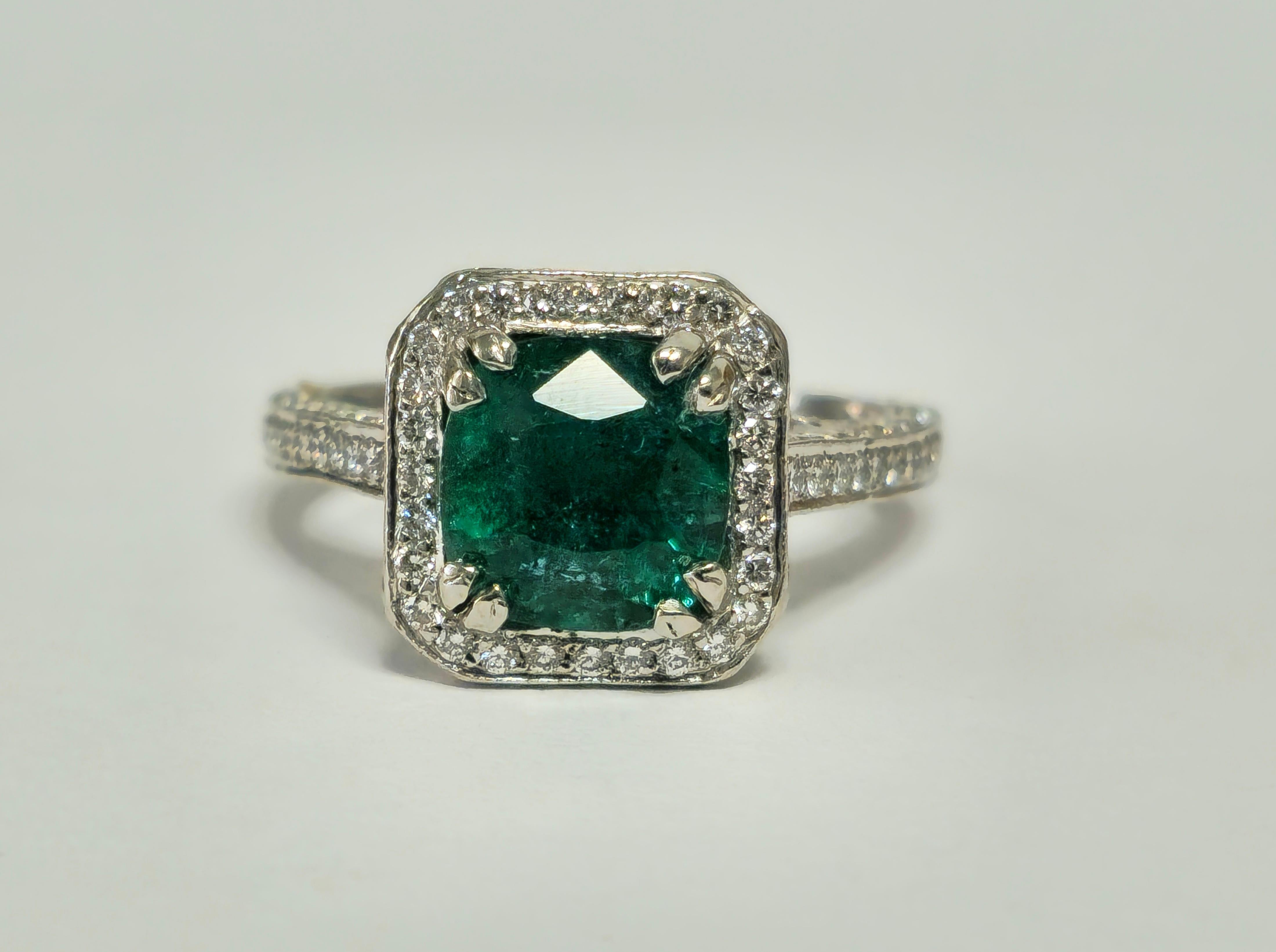 Forged in platinum, this captivating engagement ring boasts a majestic 4-carat cushion-cut emerald, exhibiting a mesmerizing deep saturation and stunning color. Accompanied by a total of 2.5 carats of diamonds, renowned for their VS clarity and F