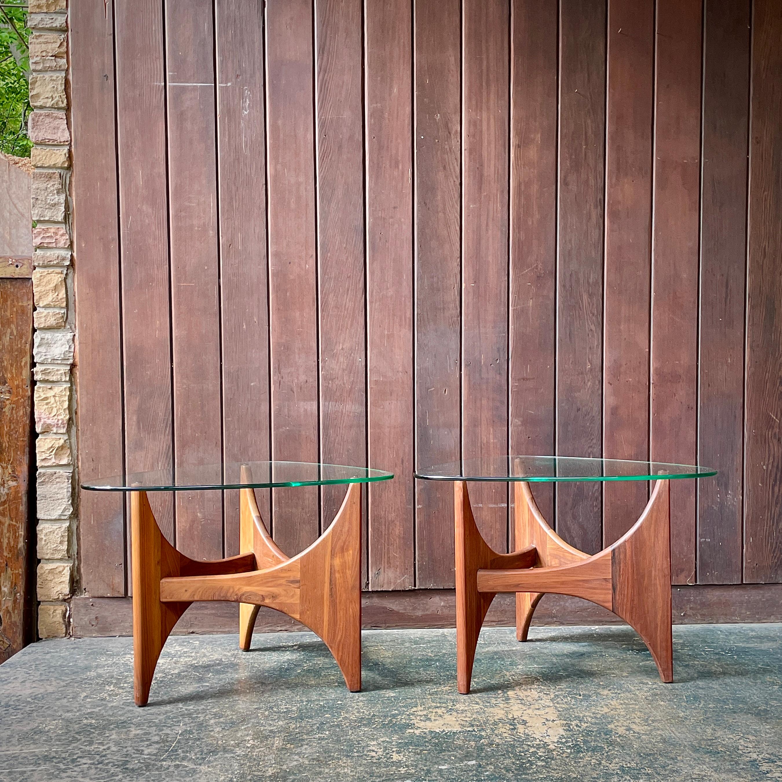 Wonderful and rare sculptural walnut side table to flank your new sofa. Some light scratches to glass surfaces but no chips to glass.