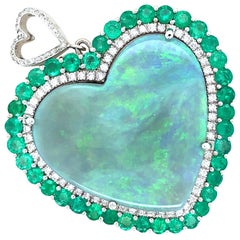 Rare 65 Carat Black Opal Emeralds and Diamonds Pendant