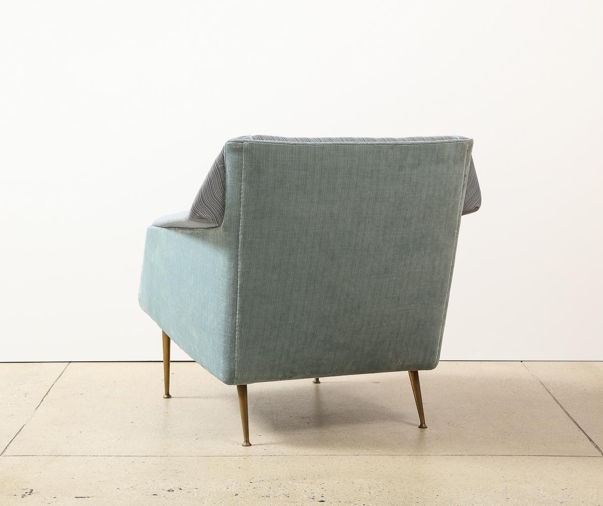 Wood, fabric, brass. Rare variant of the popular 802 chair. Made in Italy for the American market. & retailed through M. Singer & Sons. Sculptural lounge chair, fully upholstered in contrasting blue fabrics. This example is particularly desirable