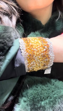 Raro bracciale largo con diamanti ombré di 85,64 carati in bianco e giallo (18 carati)