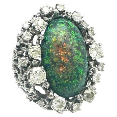 Loose 13 carat oval Australian Black Opal spectacular colors