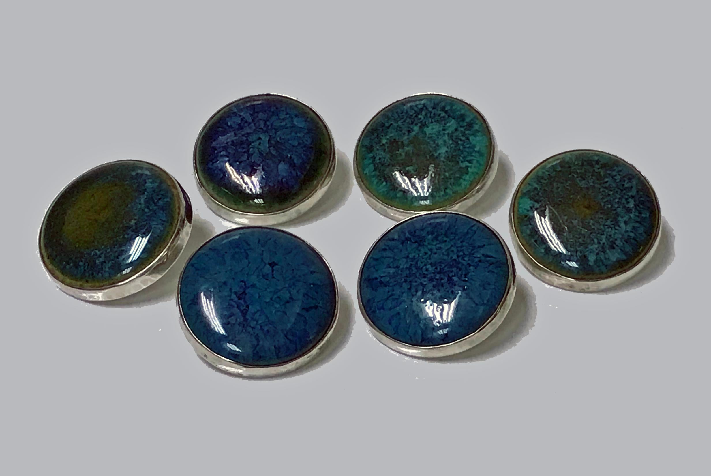 Very rare set of six English silver hallmarked buttons, Birmingham 1903 by A.E.Jones. Each of circular shape, silver bezel set with a blue green Ruskin plaque, diameter approximately 25mm. All fully hallmarked on reverse. Total Item Weight: 41.25