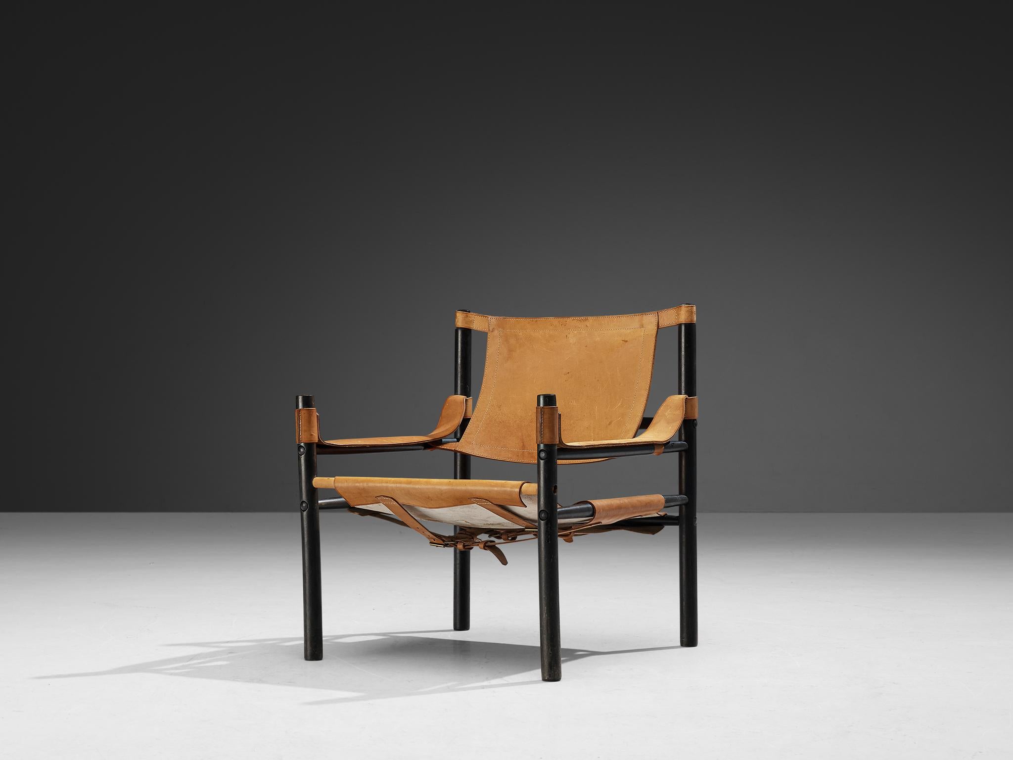 Abel Gonzalez, sling safari chair, wood, leather, brass, Argentina, 1960s.

This safari chair by the Argentinian designer Abel Gonzalez is based on a proportioned layout. Straight lines and geometric shapes dynamically structure the design. The