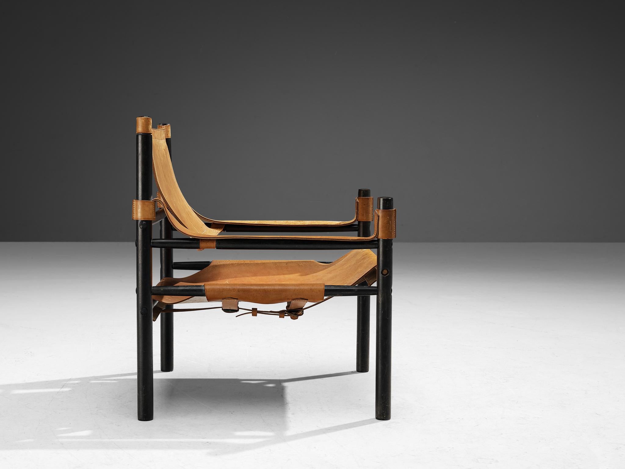 Silla Safari Abel González en piel coñac mediados del siglo XX en venta