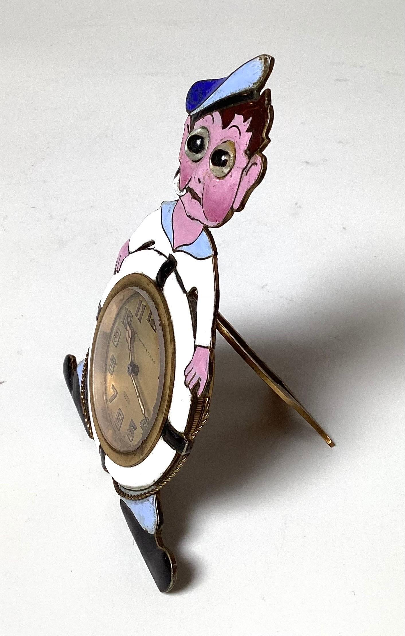 Original 8 day clock by Abercrombie and Fitch. The enamel clock in the form of a sailor with a pipe and life preserver. Marked on the face also marked Made in Switzerland for the works, and Germany for the case.. 5 inches tall, runs well..