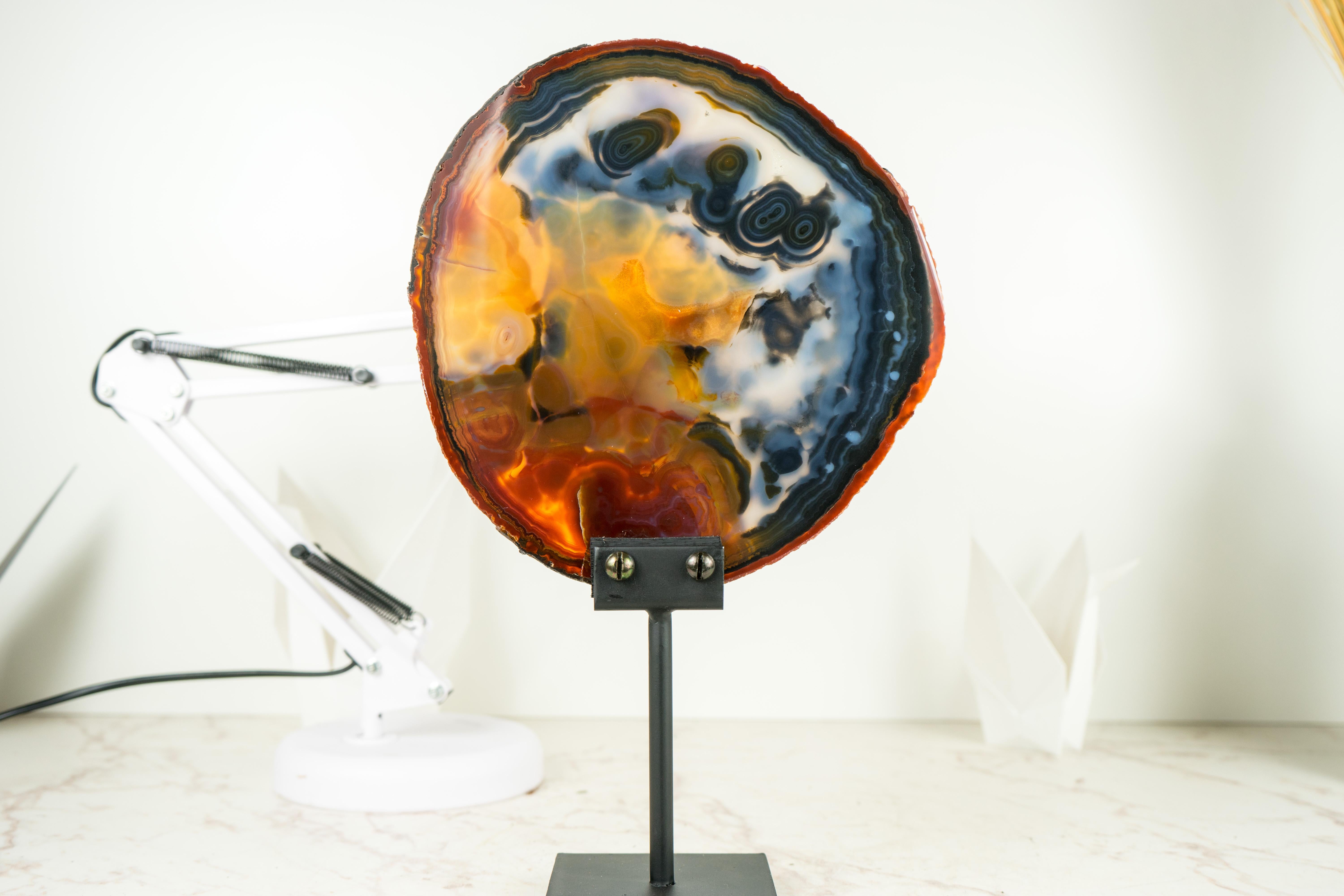 Natural Abstract Painted Agate Slice with Rare, One-Of-A-Kind Color Combination

▫️ Description

A natural masterpiece, this agate slice features bands in various shades of orange, red, yellow, and white, interspersed with occasional darker areas,