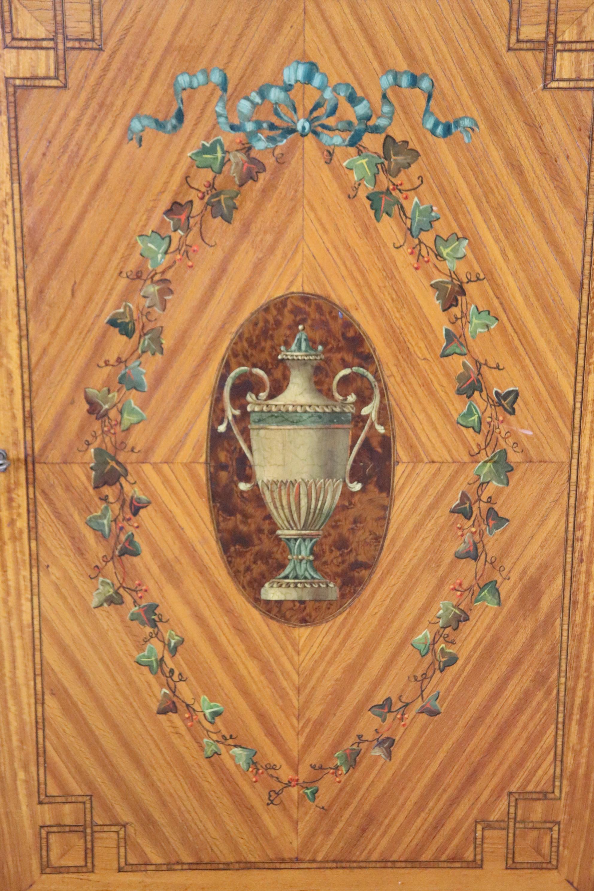 This is a gorgeous cabinet made perhaps in Illinois or Michigan and is of the highest possible quality. Featuring some of the world's most expensive woods, satinwood from Cyprus and Burled walnut from England, this cabinet would have been made for a