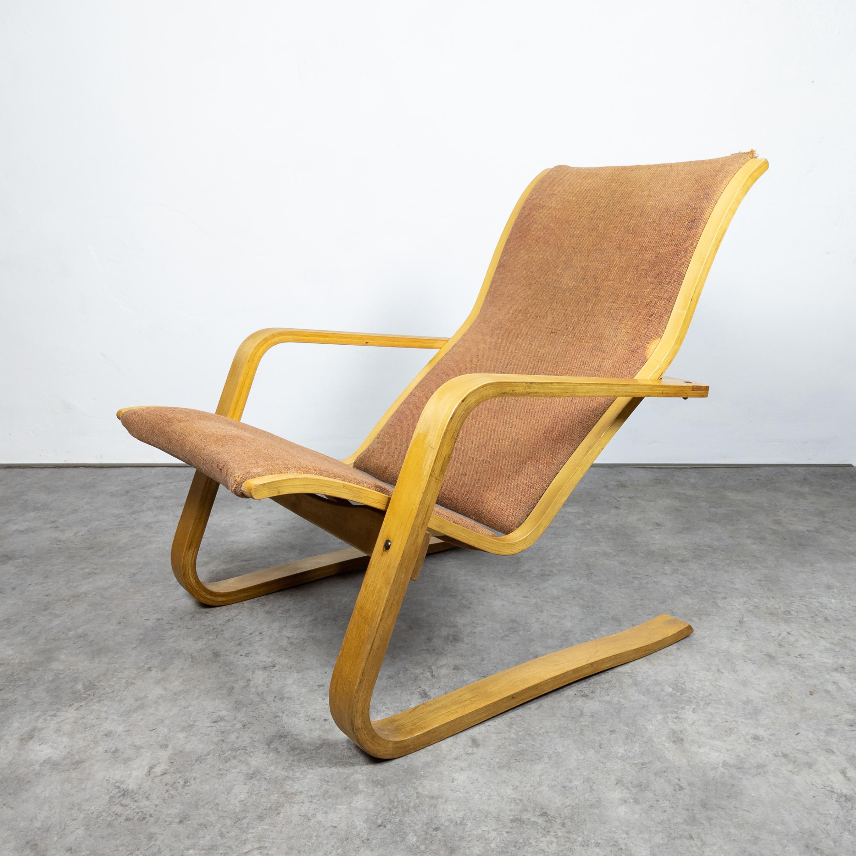 Rare and unique lounge chair made of bent laminated plywood. Manufactured in limited series of 1 000 pcs by Drevopodnik Holešov, former Czechoslovakia in 1950s. Designed by company trio of famous Czech architects Jan Šrámek, Zbynek Hrivnác and Jan